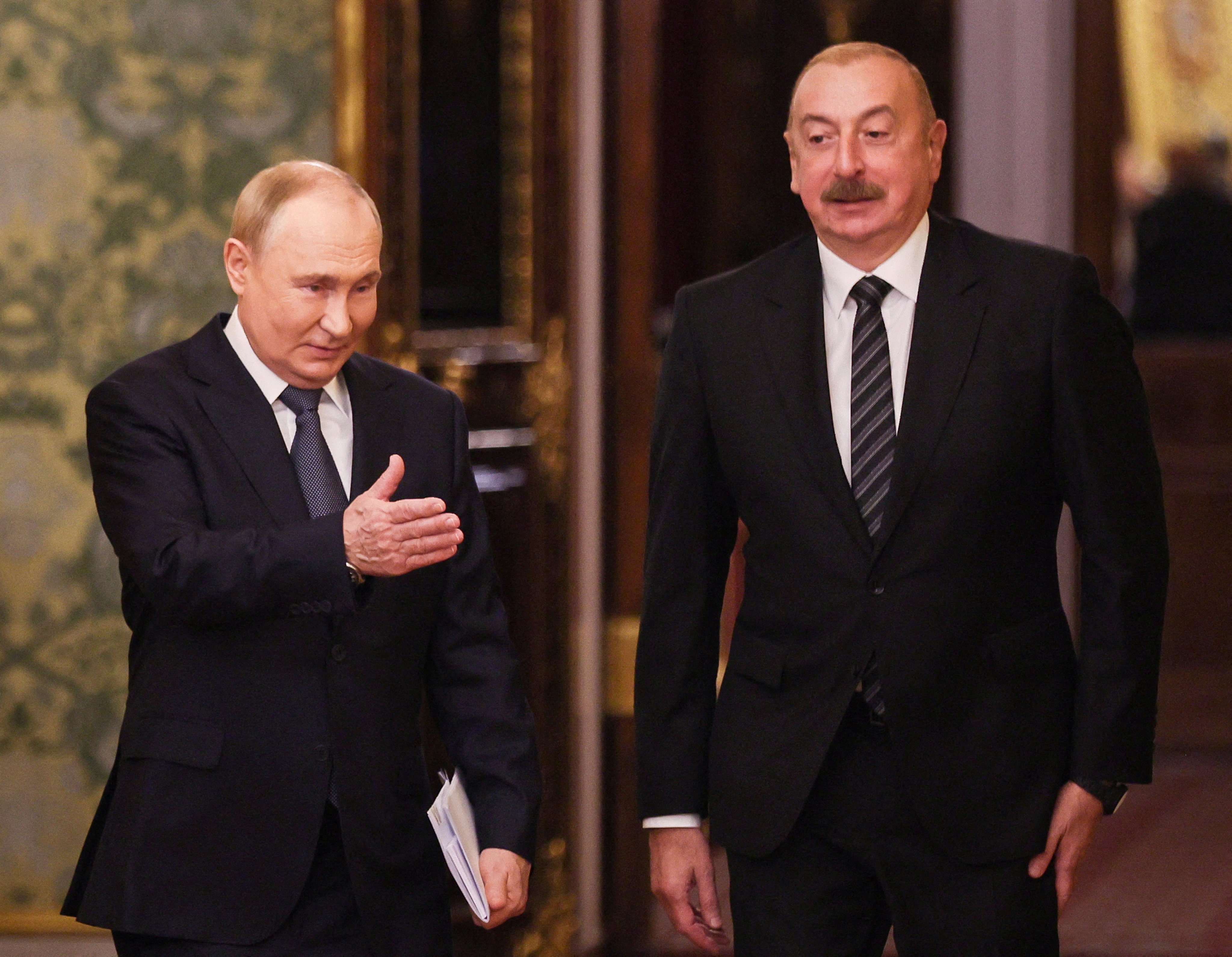 Russian President Vladimir Putin, left, and Azerbaijani President Ilham Aliyev. Photo: Pool via Reuters / File Photo