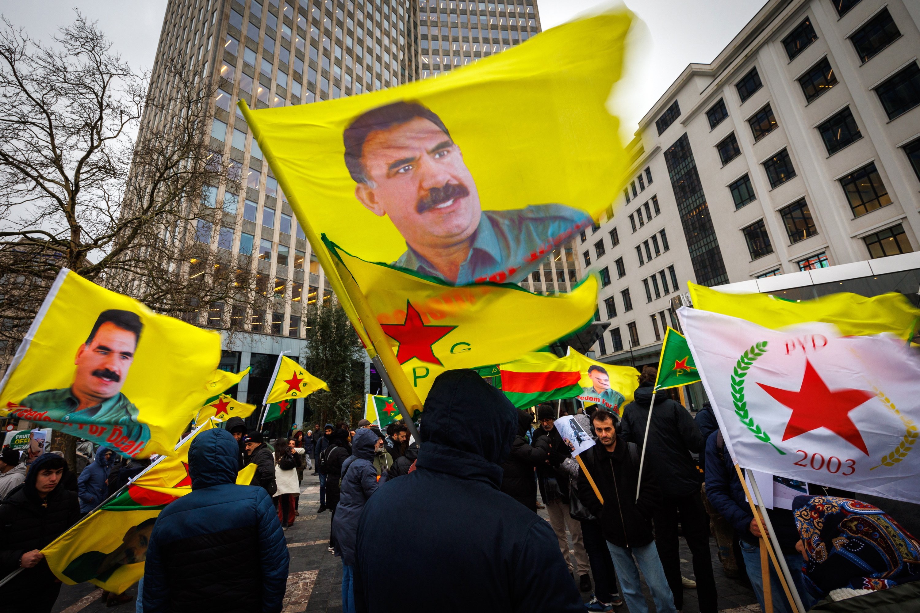 Kurds wave flags and pictures of Kurdistan Workers’ Party leader Abdullah Ocalan. Photo: EPA-EFE