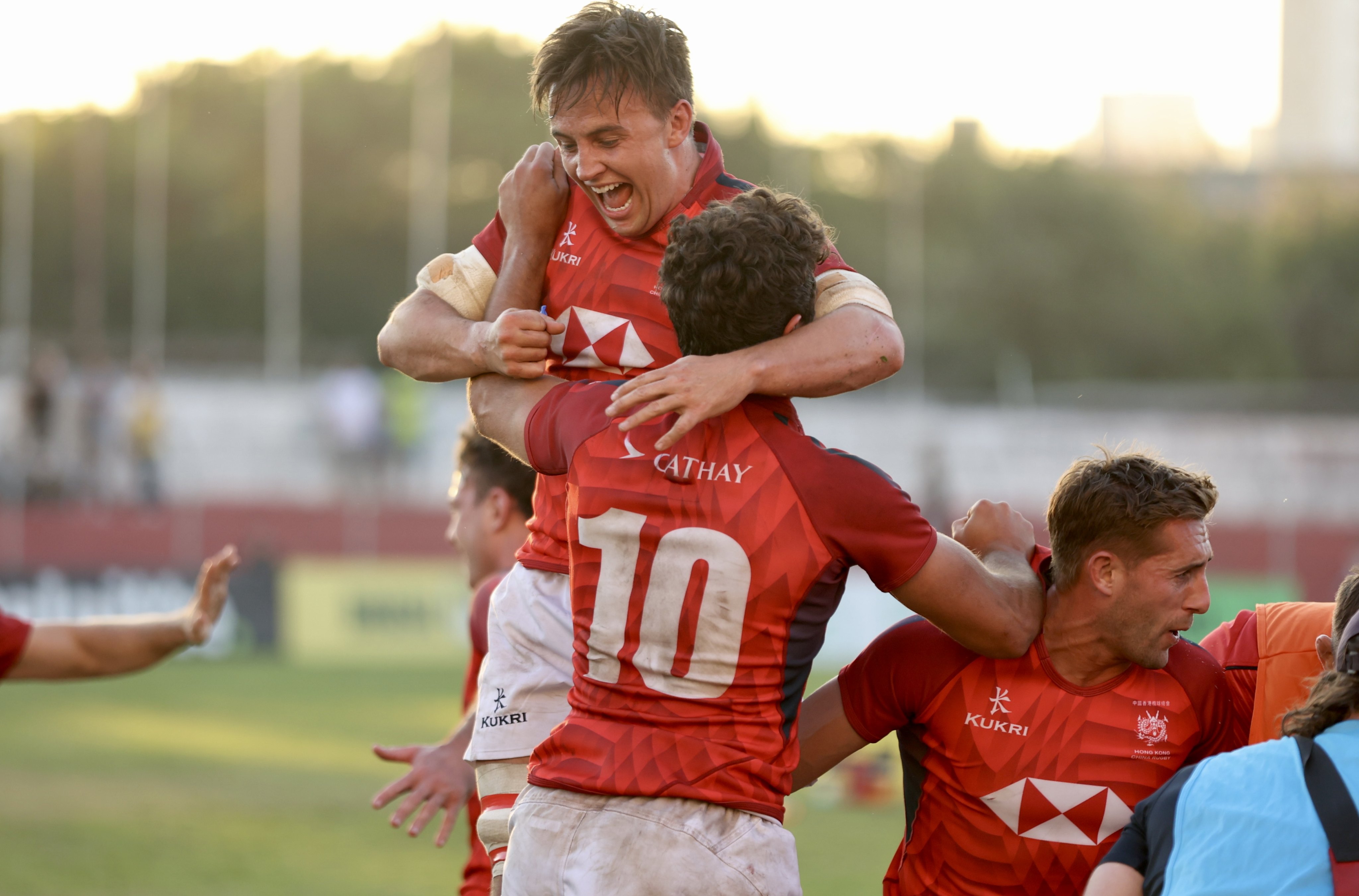 Jubilant Hong Kong celebrate their last-gasp success in Brazil this summer. Photo: Handout