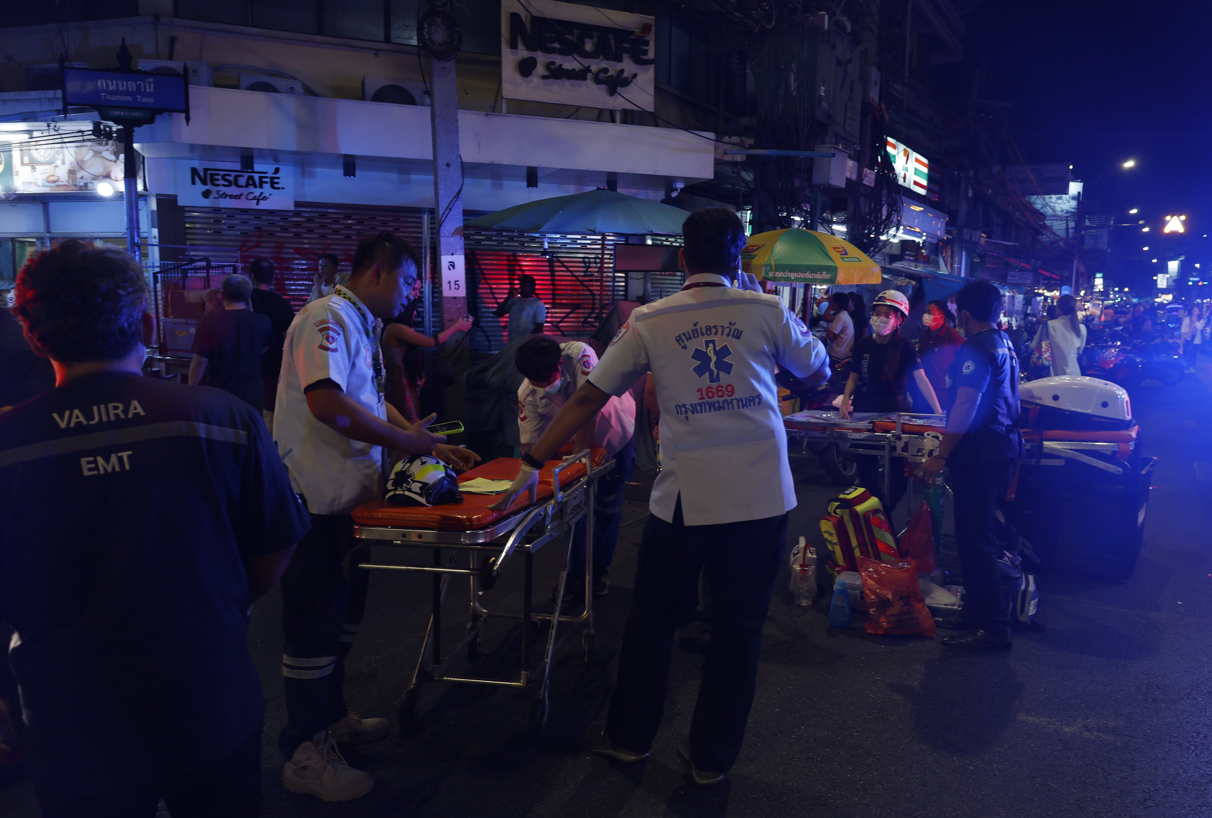 Thai rescue workers at the scene of a blaze at The Ember Hotel in Bangkok, Thailand on December 29. Photo: EPA-EFE