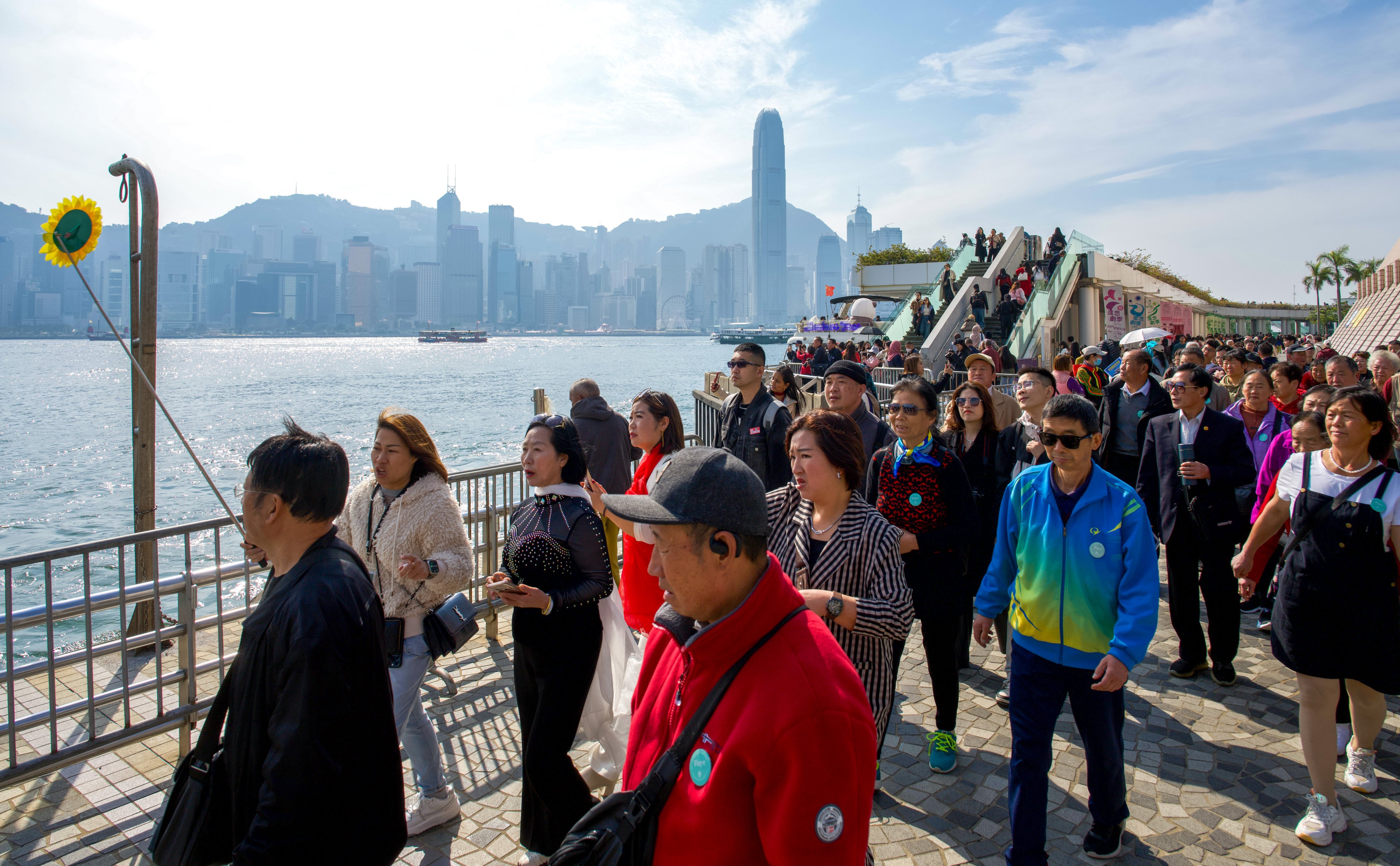 Mainland tourists visit Victoria Harbour in Tsim Sha Tsui. Photo: Sam Tsang