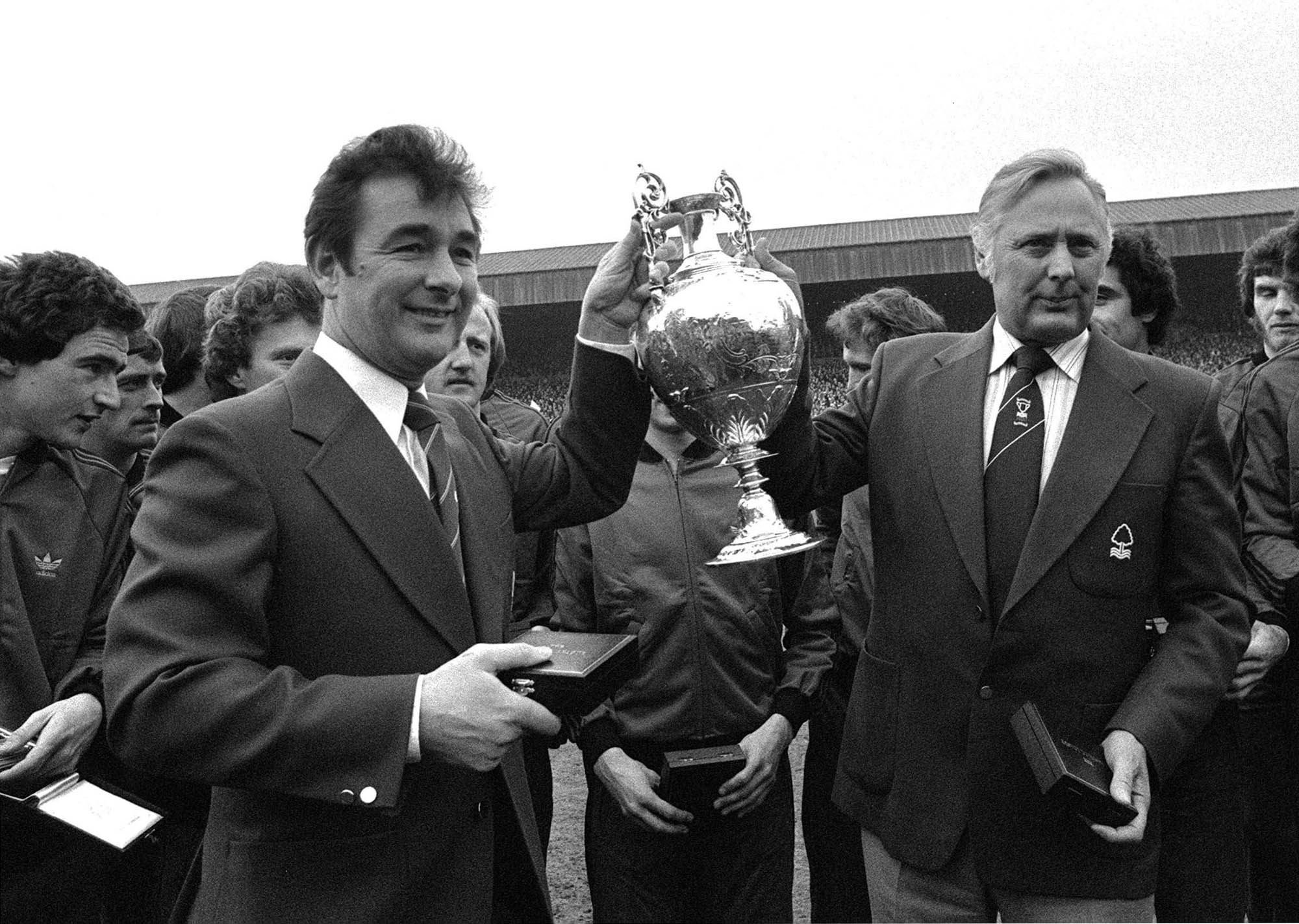 Nottingham Forest manager Brian Clough (left) and assistant manager Peter Taylor with the old First Division trophy after winning the league in 1978. Photo: AP