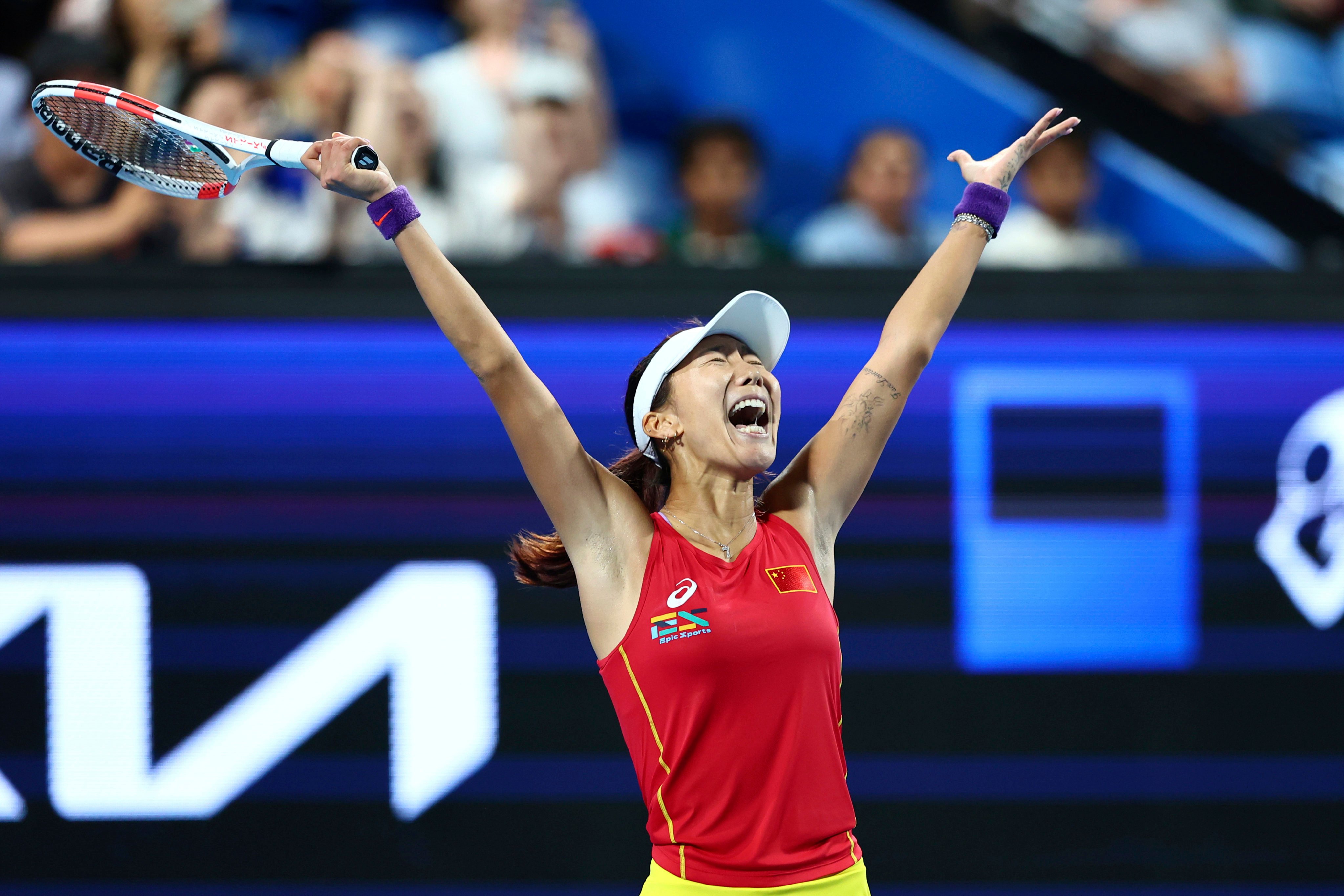 China’s Gao Xinyu celebrates her victory over Germany’s Laura Siegemund in Perth. Photo: AP