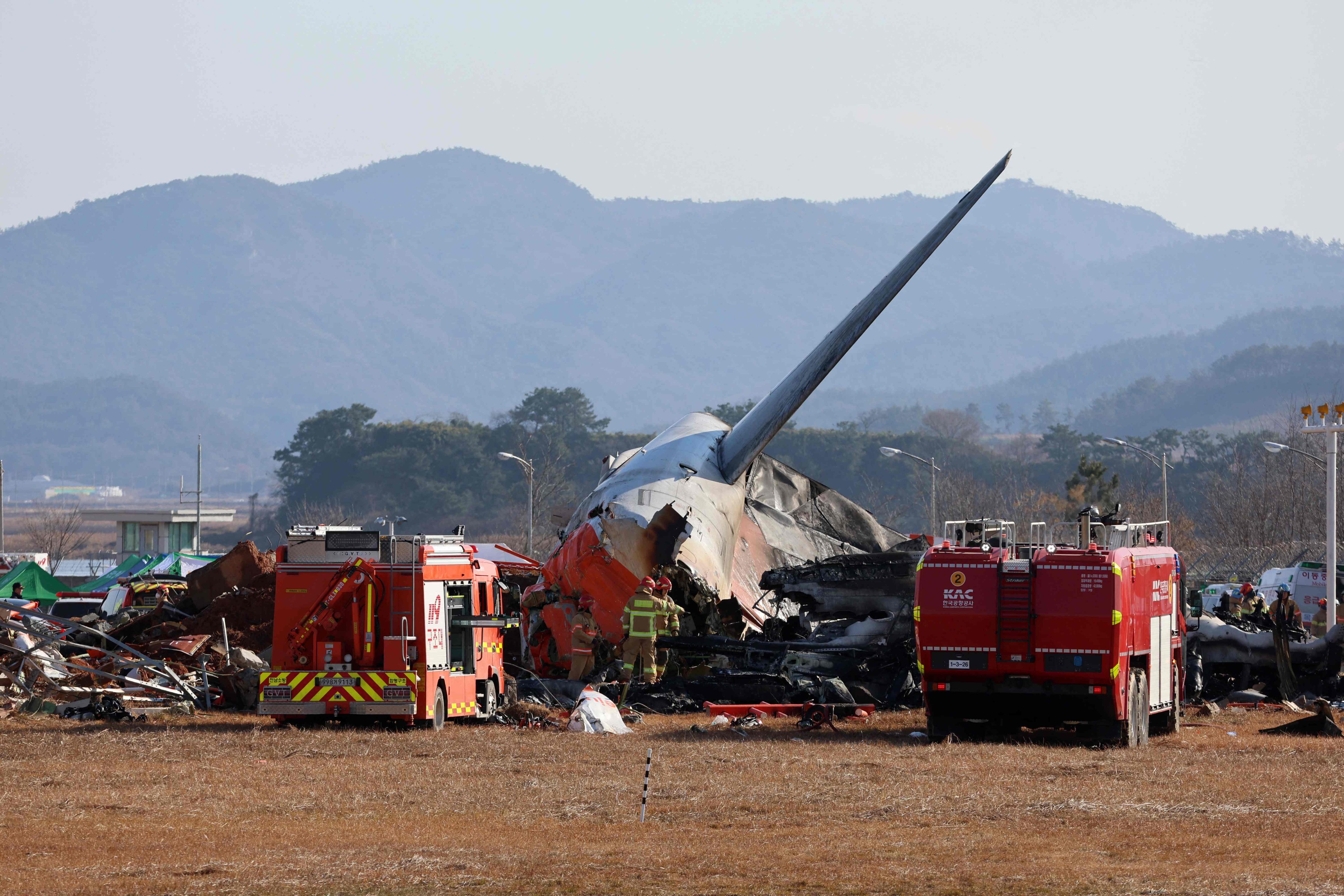 The tail section of the Jeju Air plane that crashed at South Korea’s Muan airport. Photo: AFP/Yonhap
