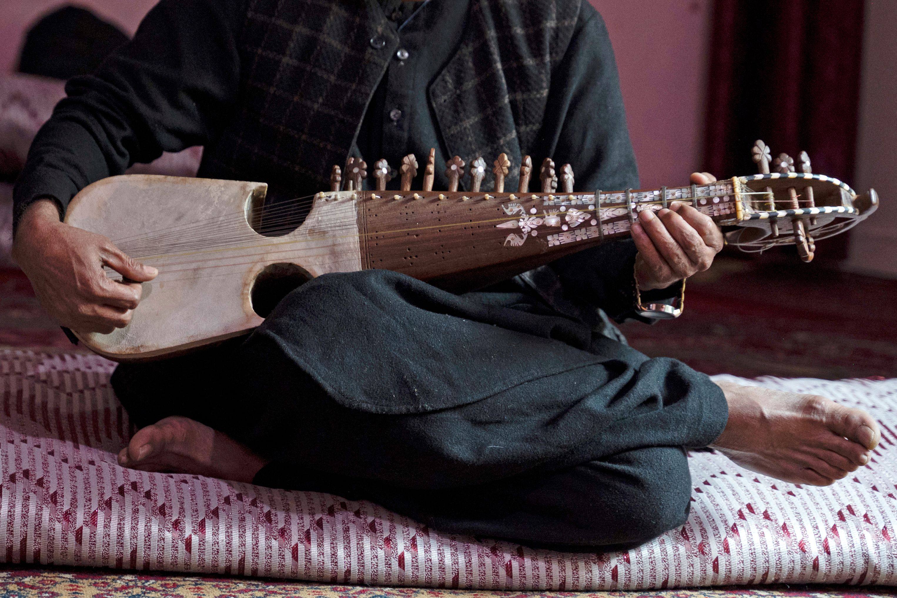 An Afghan musician plays the rubab. Unesco recently recognised the playing and making of the instrument as intangible cultural heritage in Afghanistan and neighbouring countries, but the playing of music in public is banned by Afghanistan’s Taliban rulers. Photo: AFP