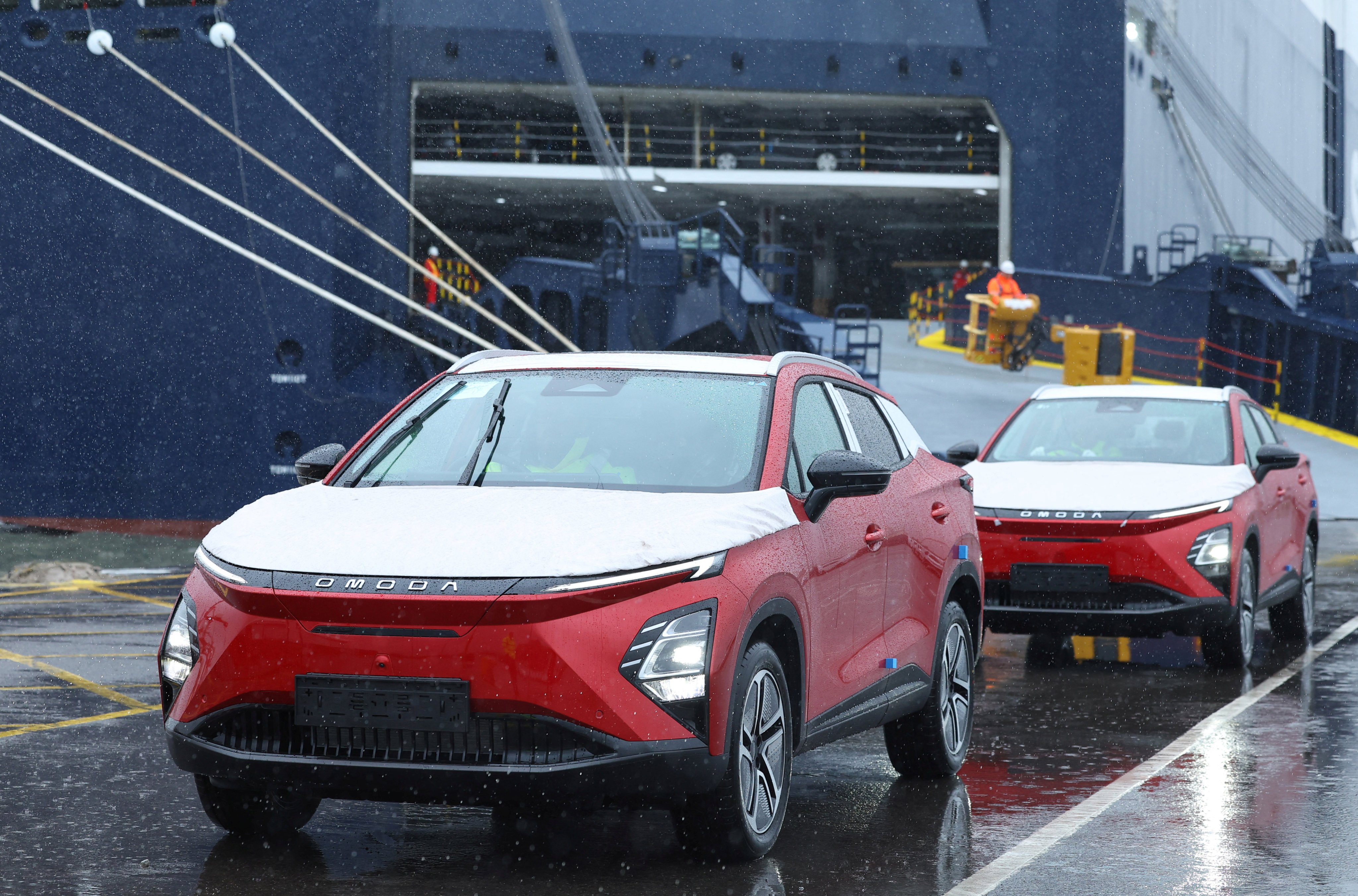 Omoda E5 electric cars manufactured by Chinese automaker Chery are unloaded from a cargo ship at the Royal Portbury Dock, near Bristol in southwestern Britain on September 5, 2024. Photo: Reuters