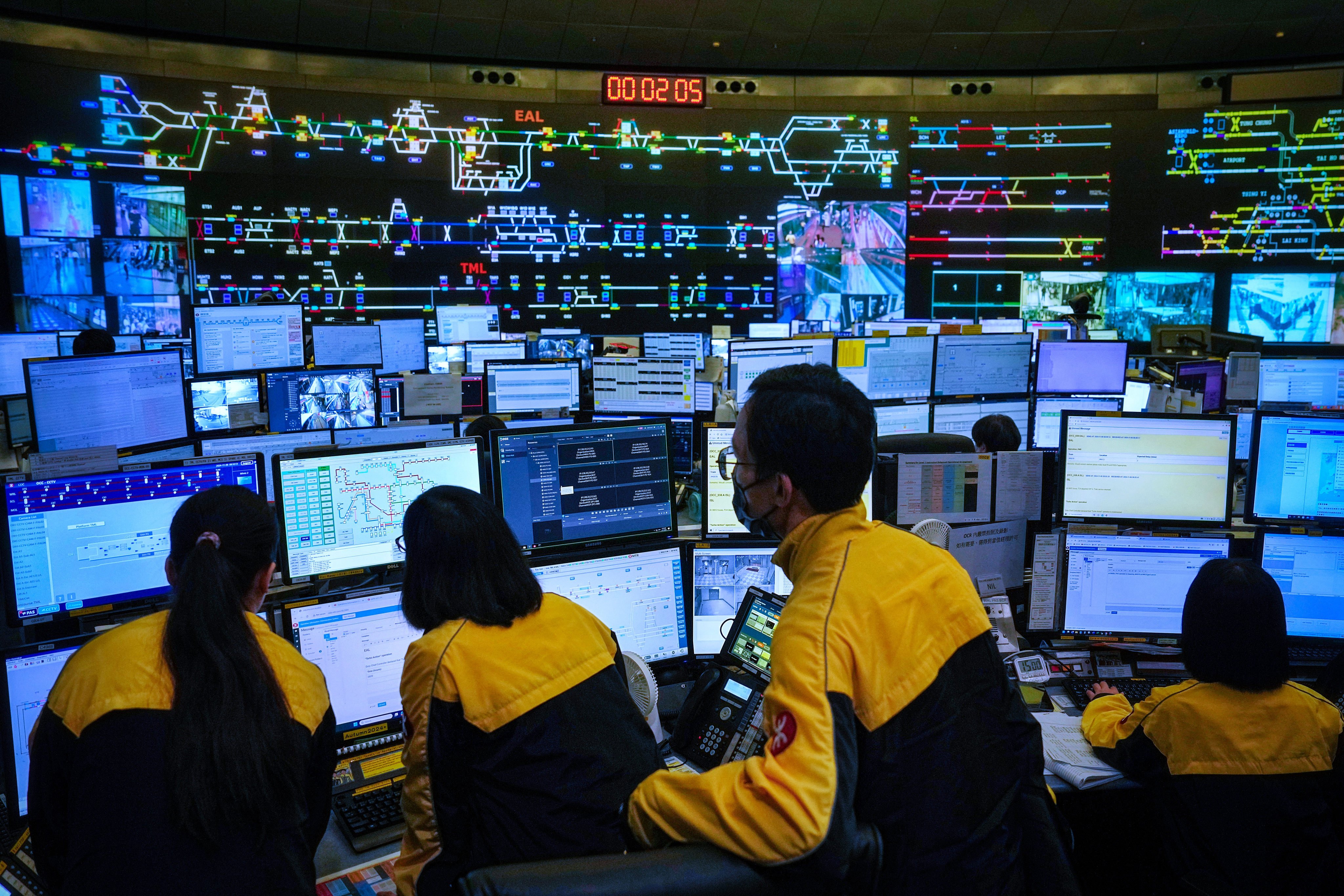 MTR controllers oversee daily train service in a room described as the “brain” for most of the company’s rail network. Photo: Elson Li