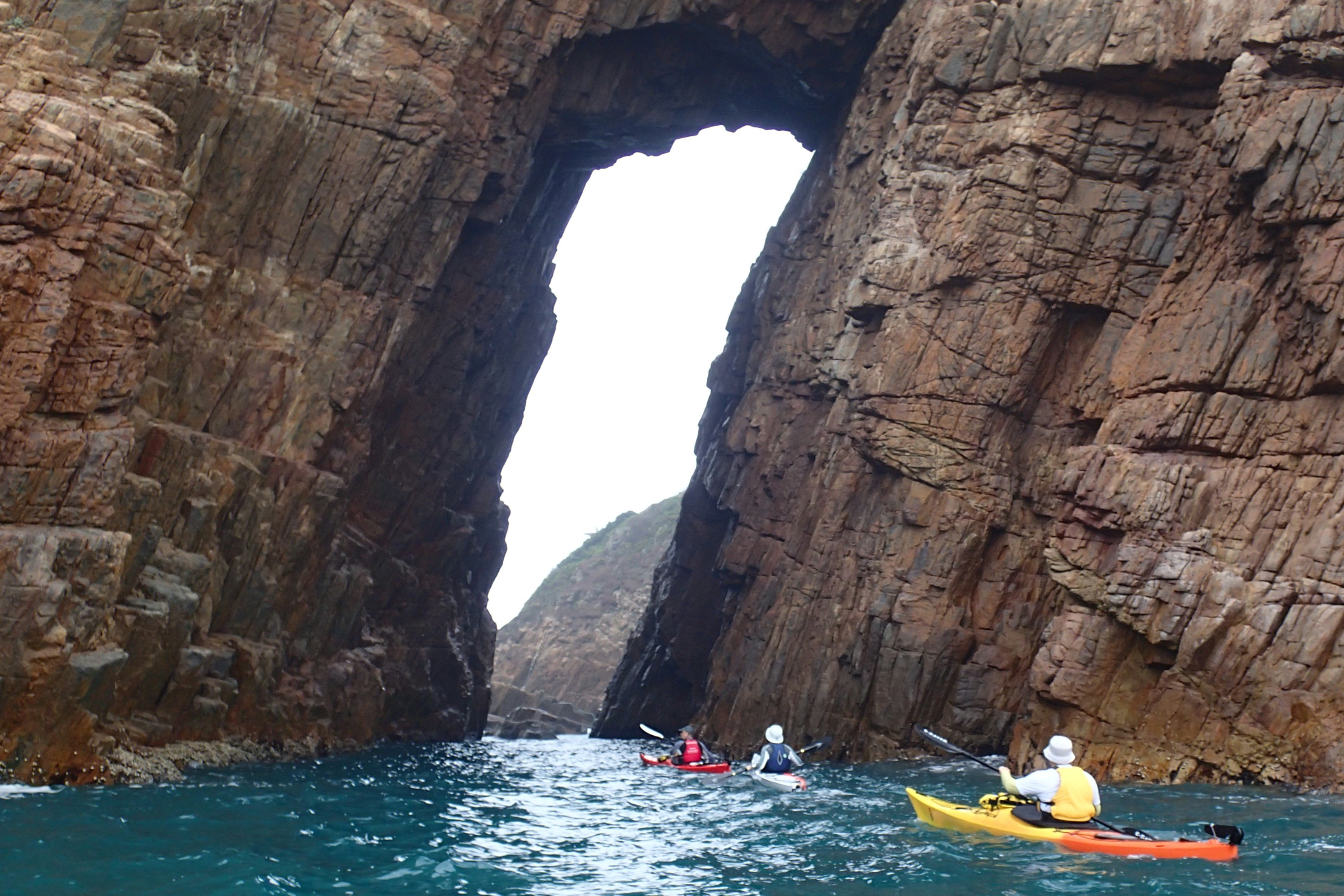 Kayakers explore basalt island in Hong Kong Geopark in 2016. Photo: Cameron Dueck