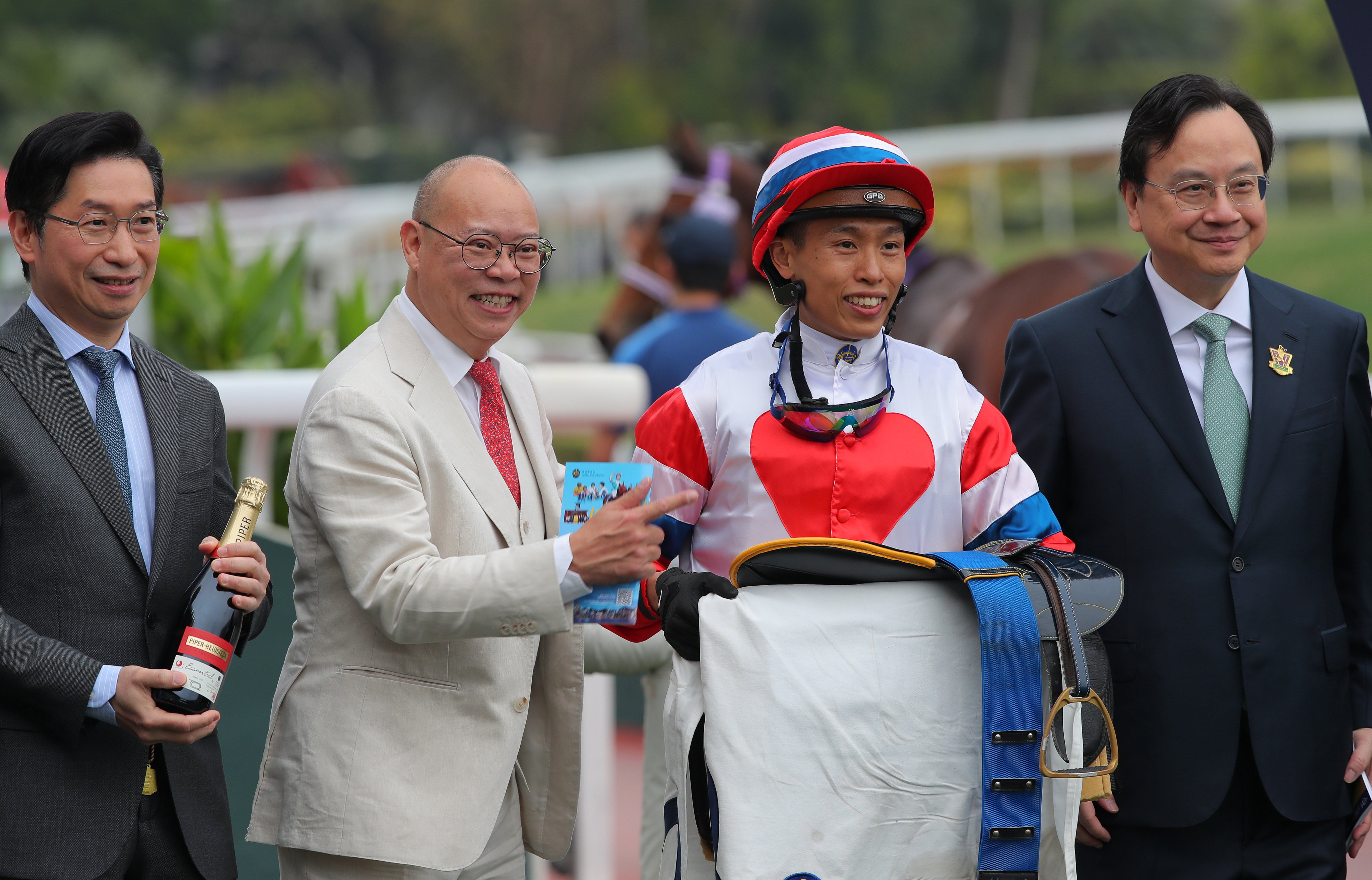 Trainer Chris So (second from left) and jockey Vincent Ho teamed up for a double at Sha Tin on Wednesday. Photos: Kenneth Chan