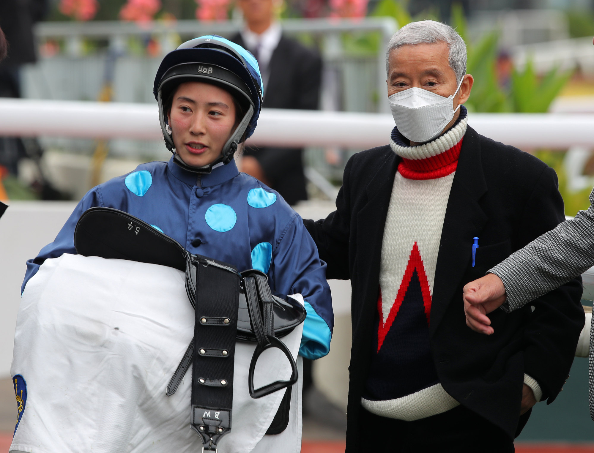 Apprentice Britney Wong and trainer Benno Yung after Fun Elite’s win.