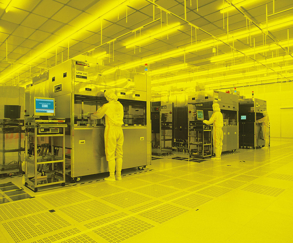 Workers in the clean room at a foundry operated by Hua Hung Semiconductor. Photo: Handout