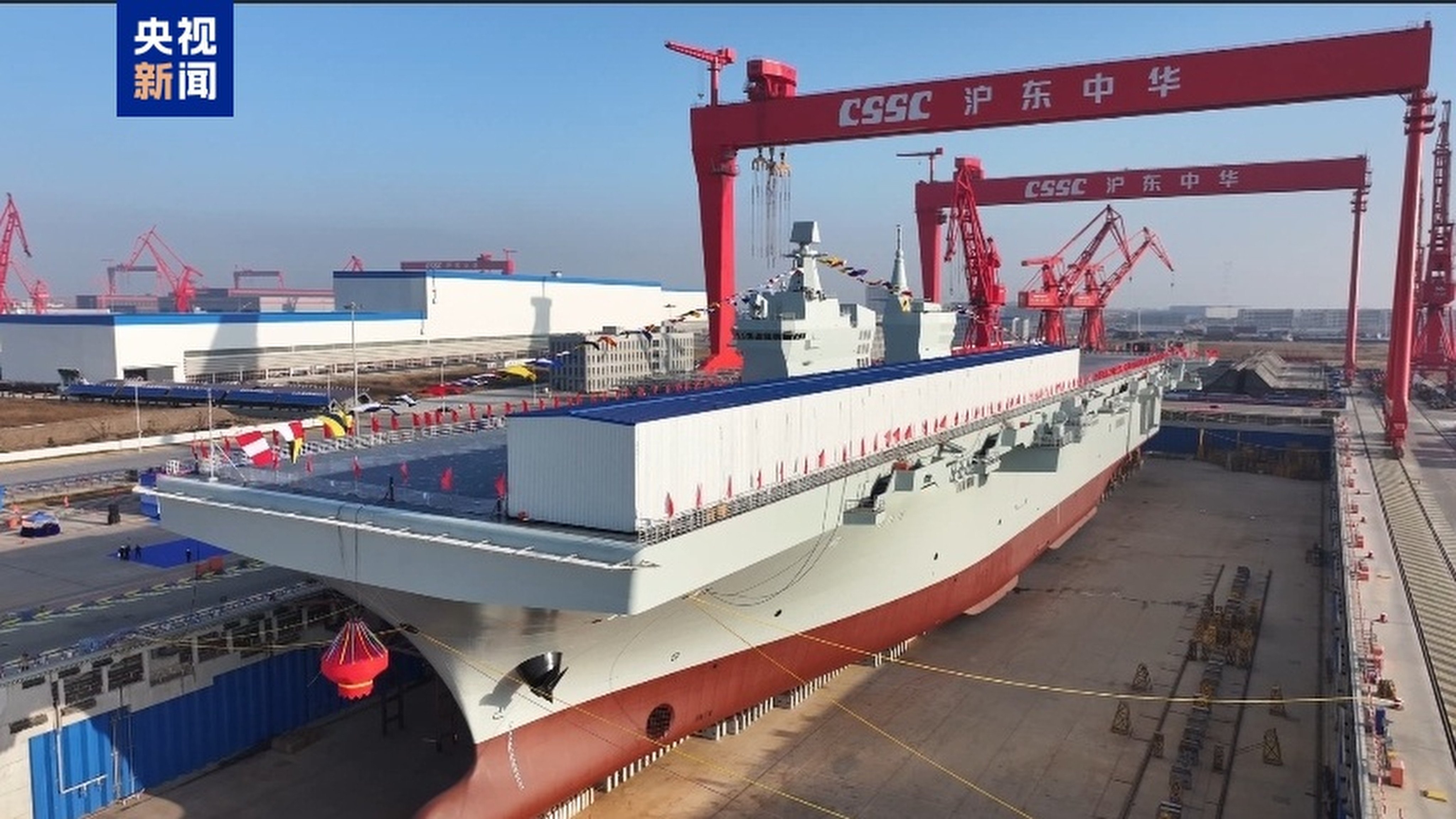 China’s first Type 076 amphibious assault ship makes its debut on Friday. Photo: CCTV