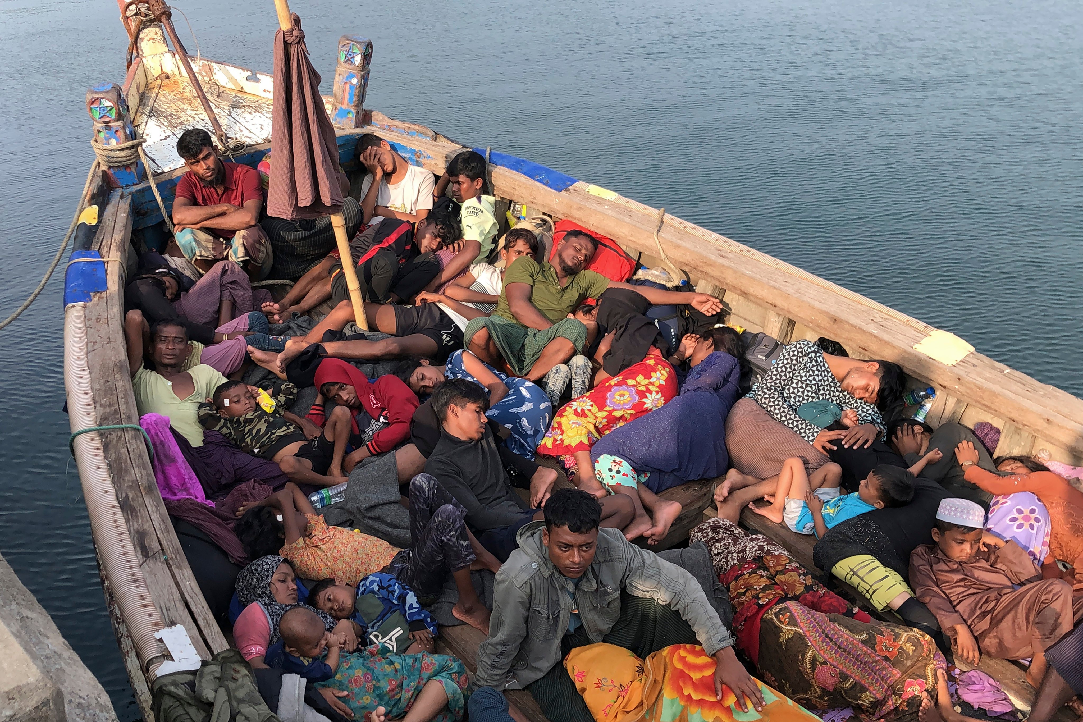 A group of people believed to be Rohingya refugees from Myanmar rest in a boat at a port in  Sri Lanka last month. Around one million Rohingya have fled Myanmar since a military offensive was launched in 2017. Photo: AP