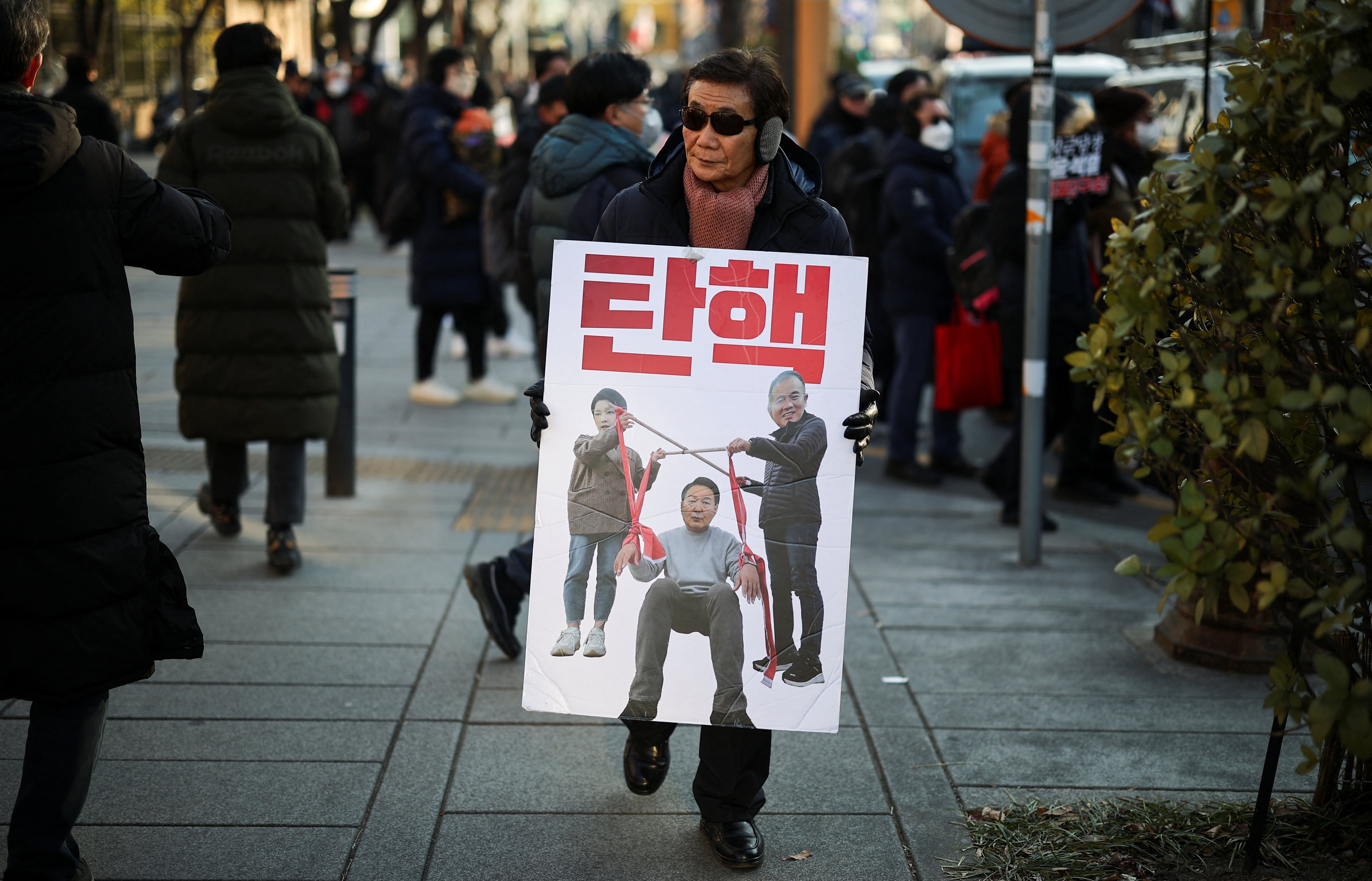 Protesters rally against South Korea’s impeached President Yoon Suk-yeol near his residence in Seoul on Friday. Photo: Reuters