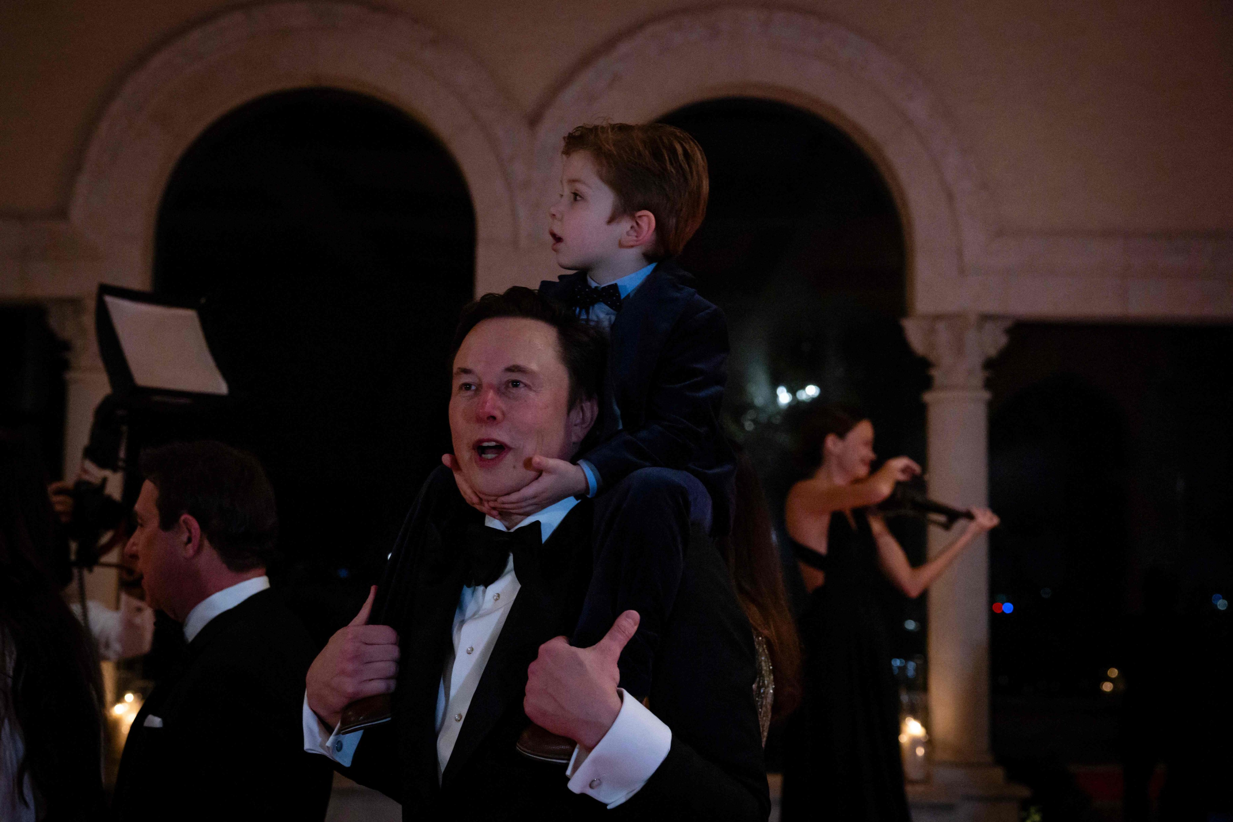 Tesla CEO Elon Musk arrives at Donald Trump’s Mar-A-Lago club in Florida on December 31. Photo: Getty Images/AFP