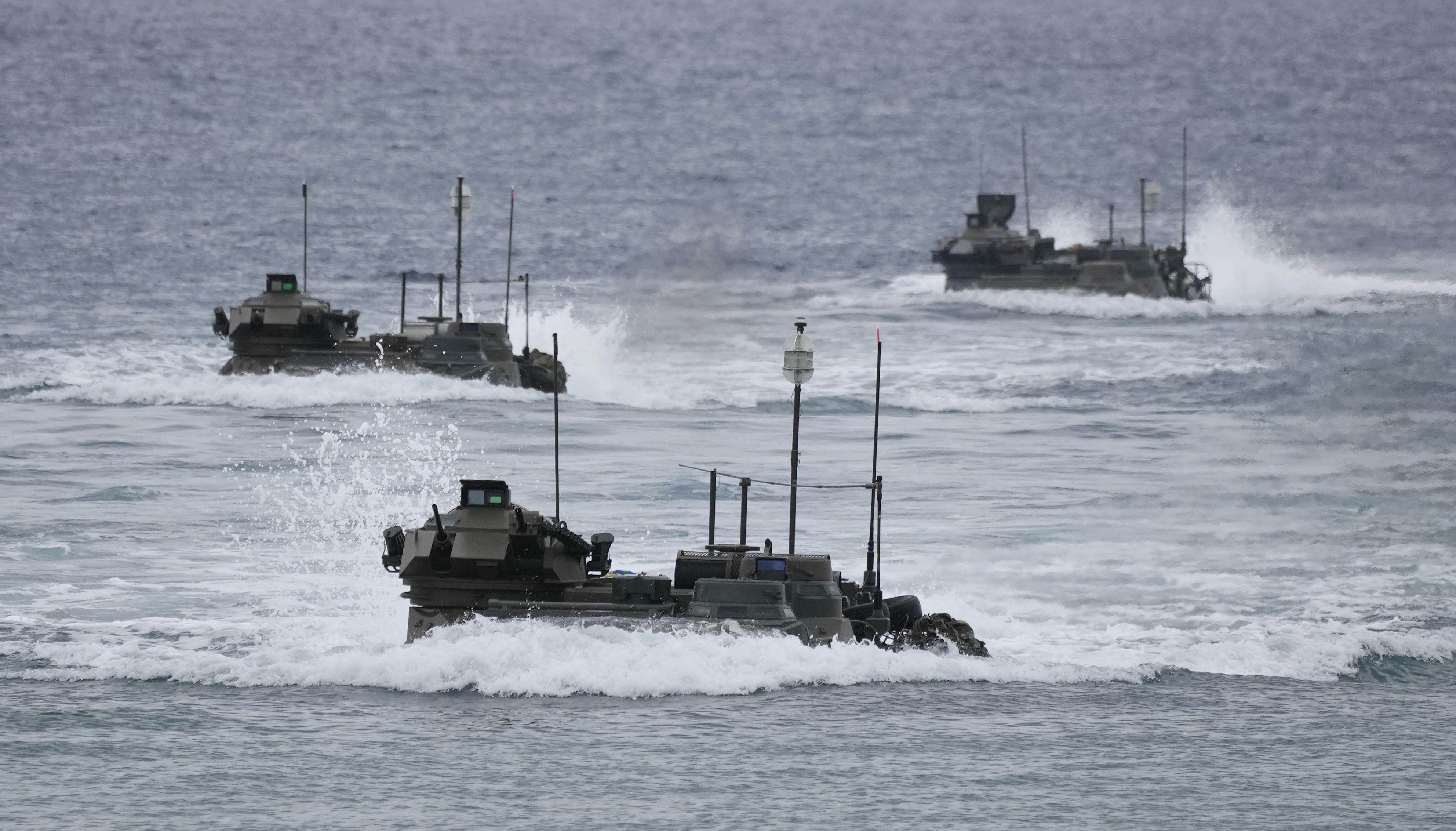 Japanese military vessels sail towards the country’s southwest in November 2023, for drills on an island seen as vulnerable to China in case of a conflict. Photo: Kyodo