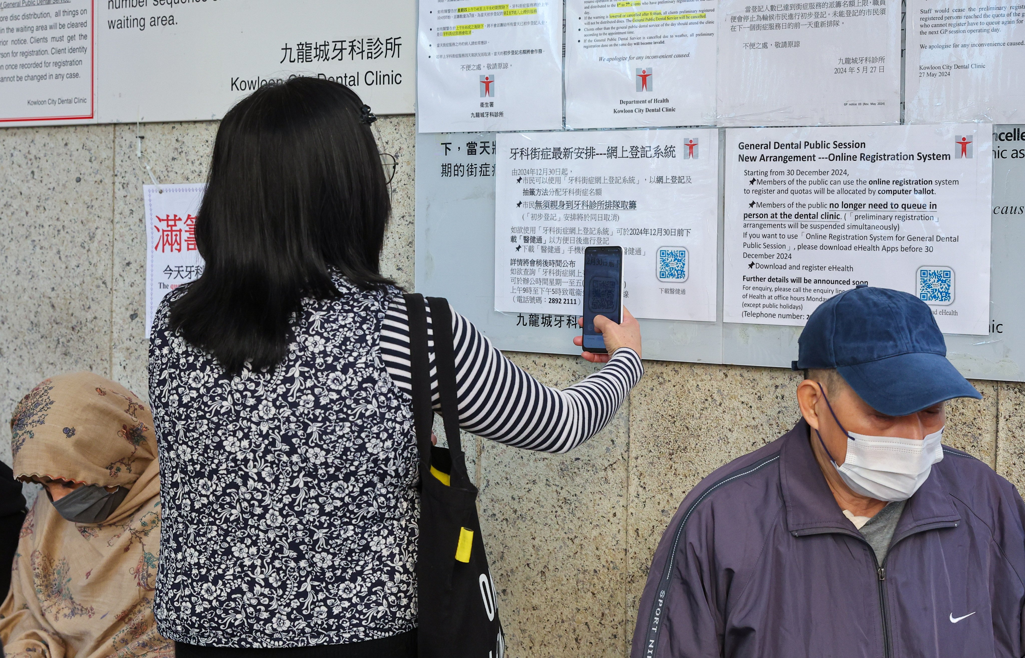 People wait outside a public dental clinic at the Kowloon City Health Centre in Hung Hom. Photo: Edmond So