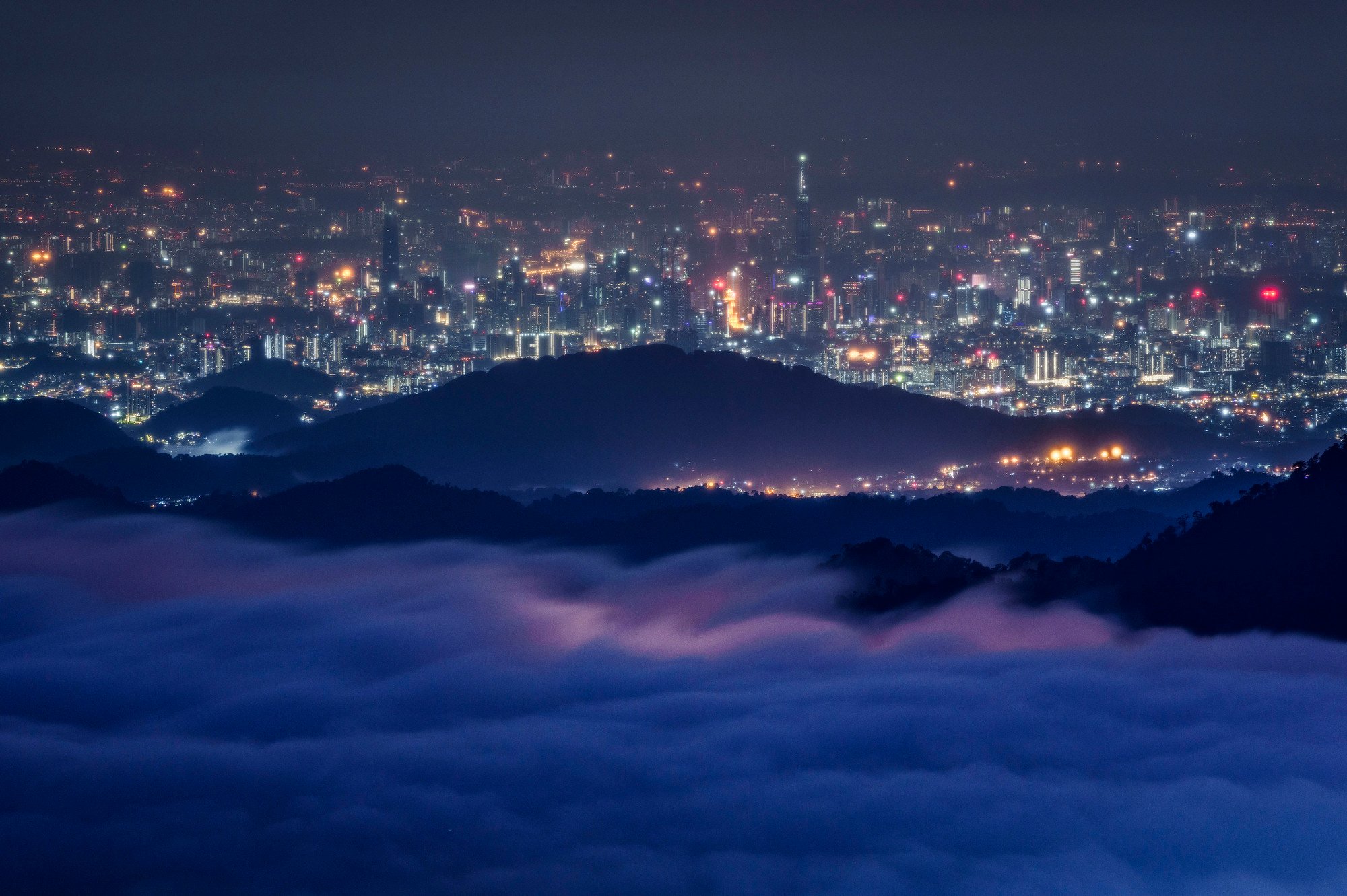 A wave of clouds roll in over the hills above Kuala Lumpur in Genting Highlands. Photo: AP