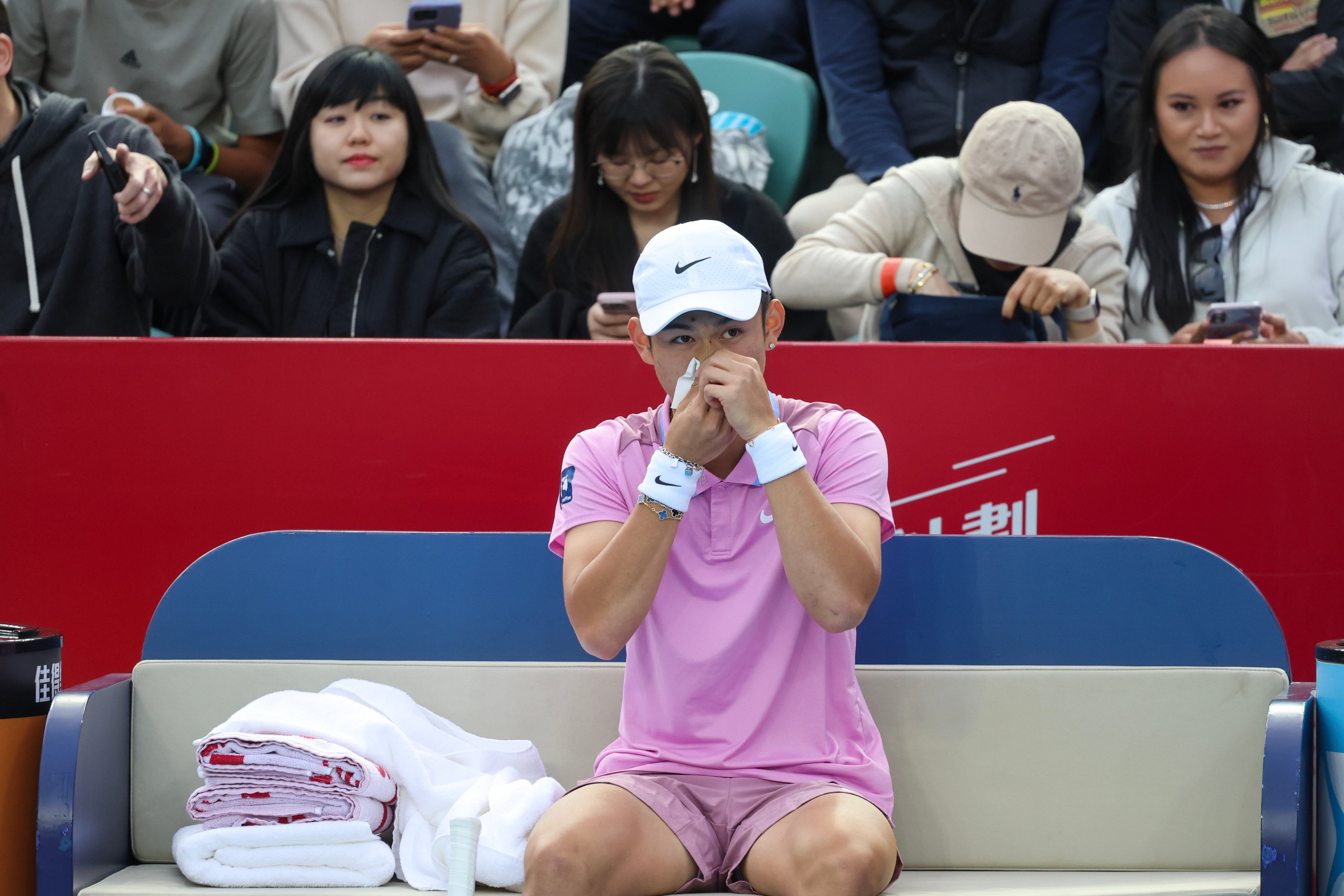 Jerry Shang before his retirement from his semi-final against Kei Nishikori of Japan. Photo: Dickson Lee