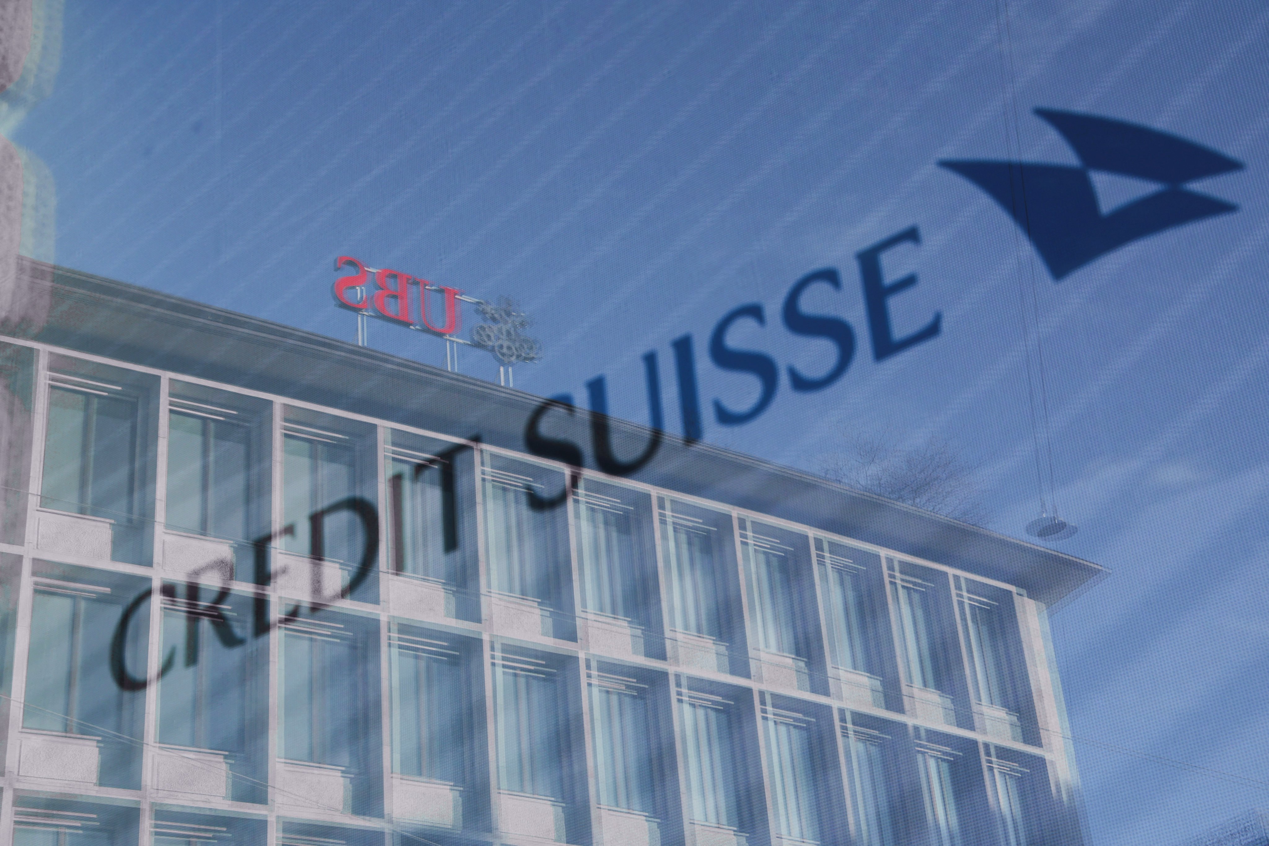 Logos of Swiss banks UBS and Credit Suisse in Zurich, Switzerland. Photo: Reuters