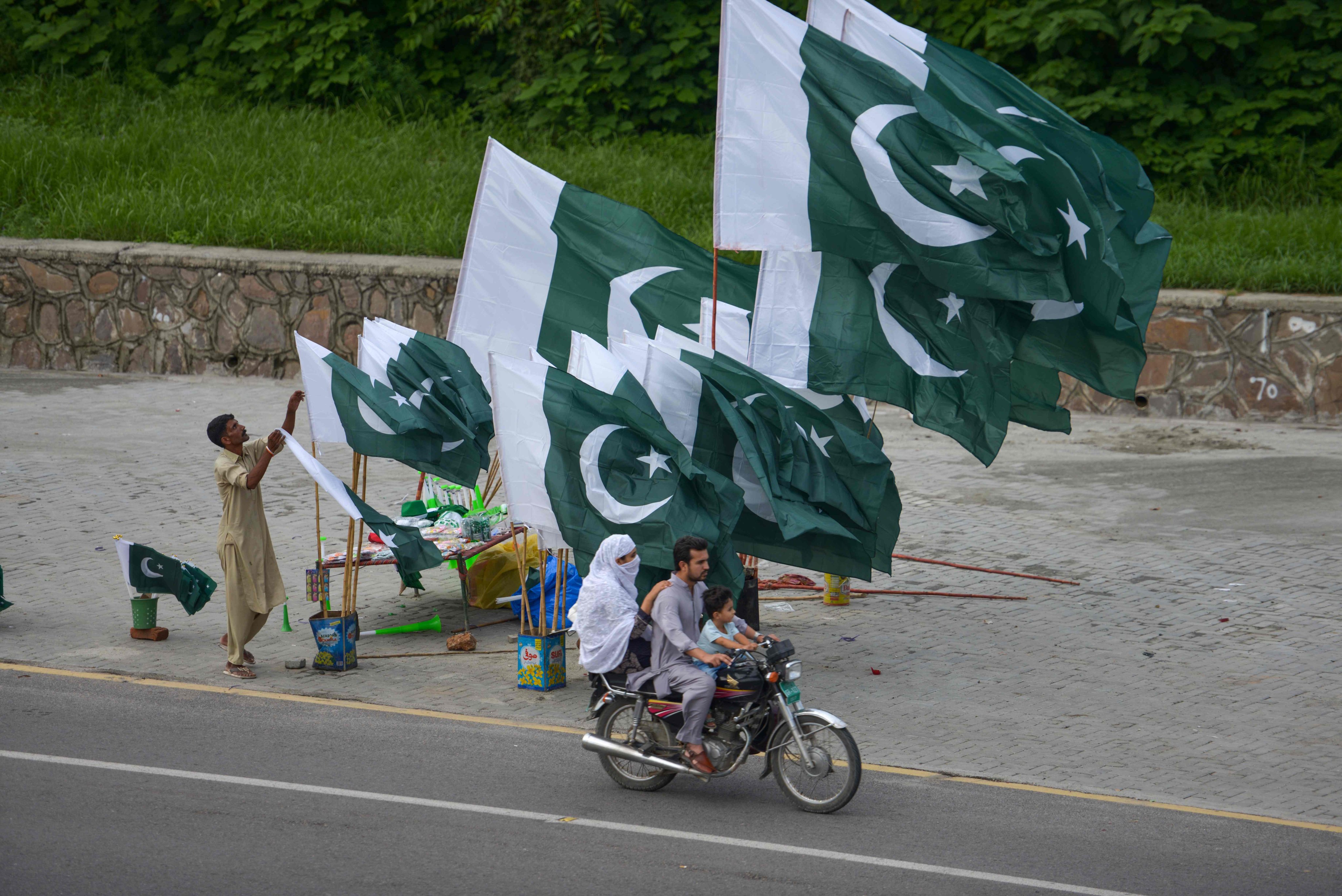 Pakistan’s national flags. On Saturday, at least six people including Pakistani paramilitary troops were killed in a bombing claimed by separatists in Balochistan. Photo: AFP