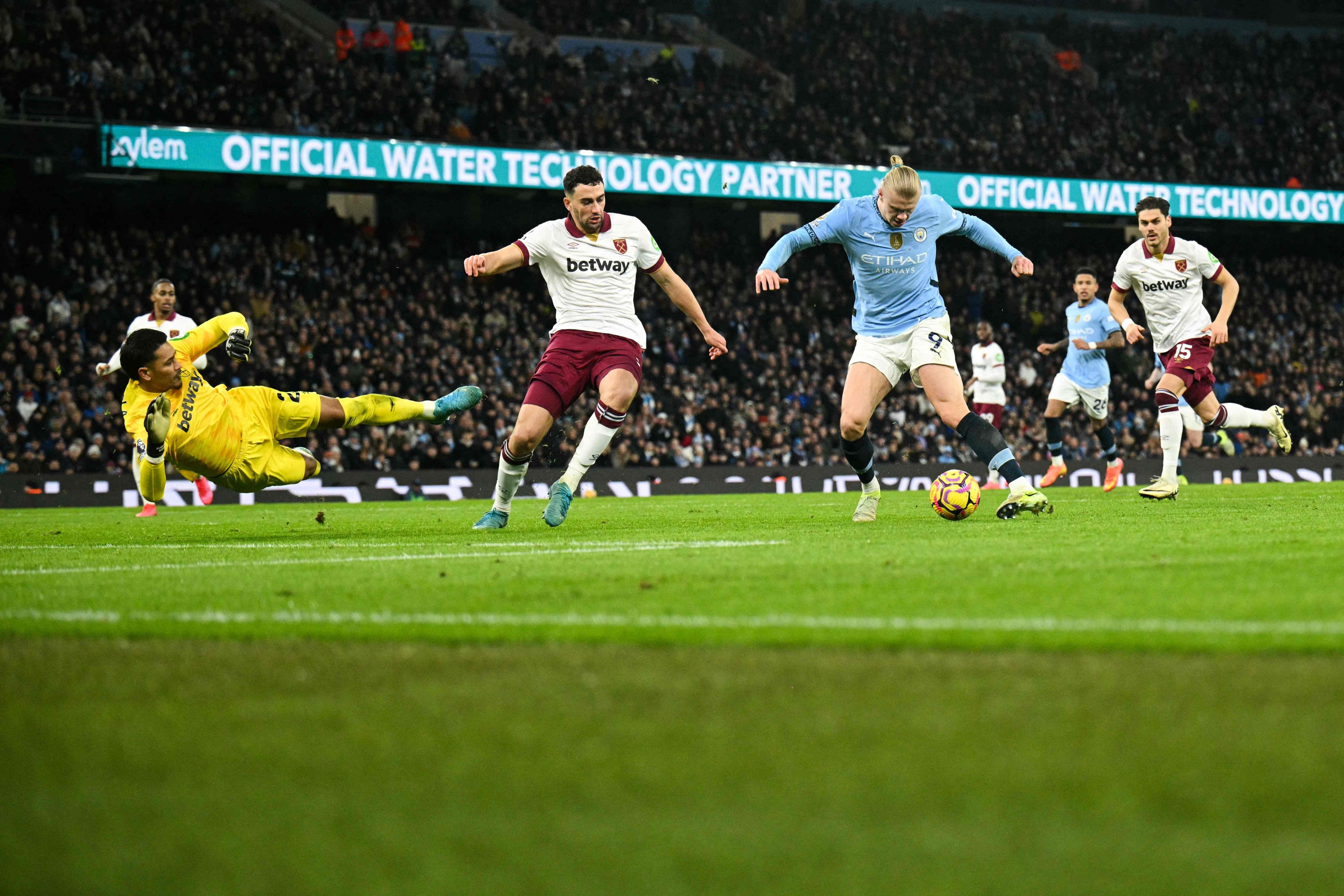 Manchester City’s Erling Haaland scores his team’s third against West Ham United at the Etihad Stadium. Photo: AFP