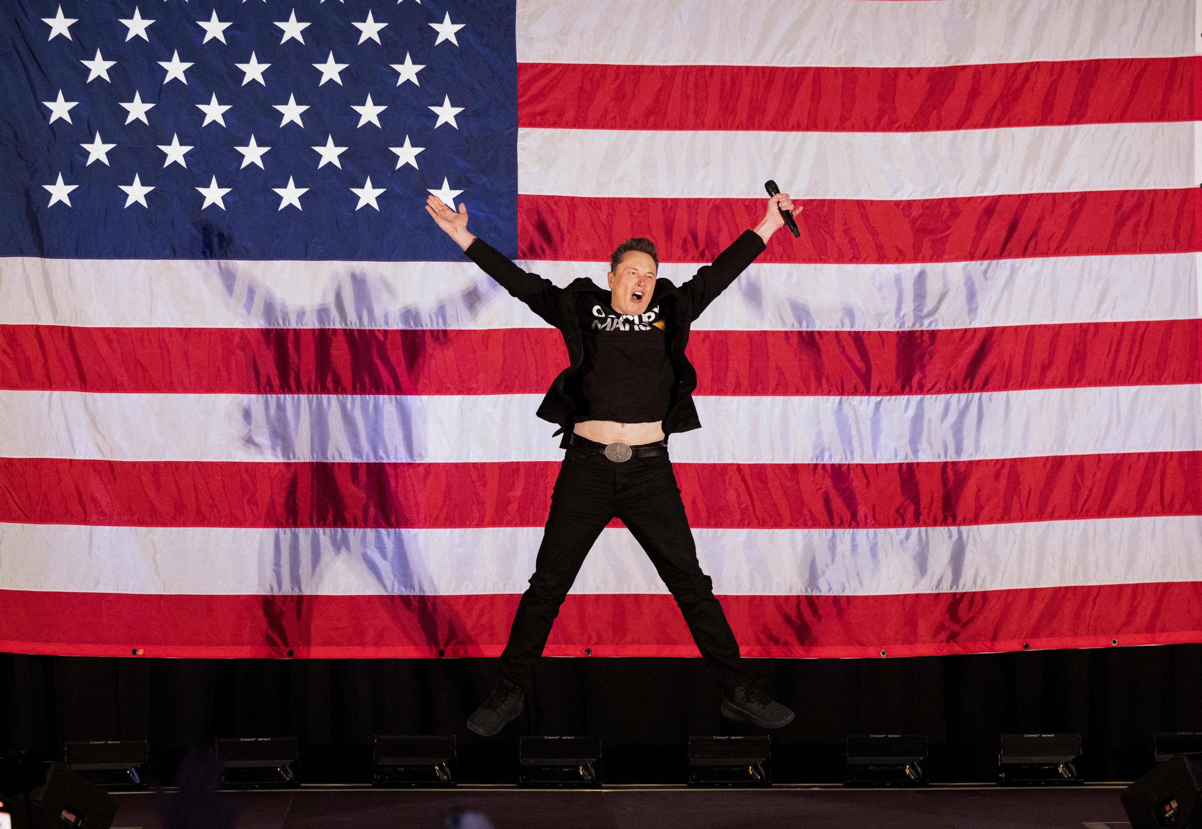 Tesla and SpaceX CEO Elon Musk rouses the crowd at an America PAC event in support of Republican presidential candidate Donald Trump in Oaks, Pennsylvania, in October. Photo: AFP