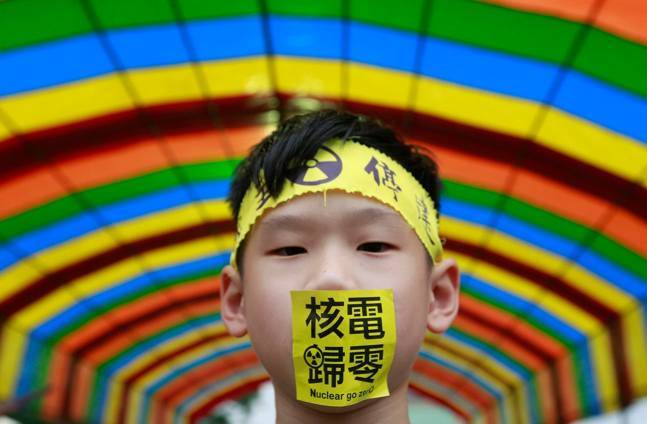 A boy at an anti-nuclear demonstration in Taipei on April 26, 2014. The sticker reads “Nuclear go zero”. Taiwan turned against nuclear as far back as 2011 in the wake of Japan’s Fukushima disaster. Photo: Reuters