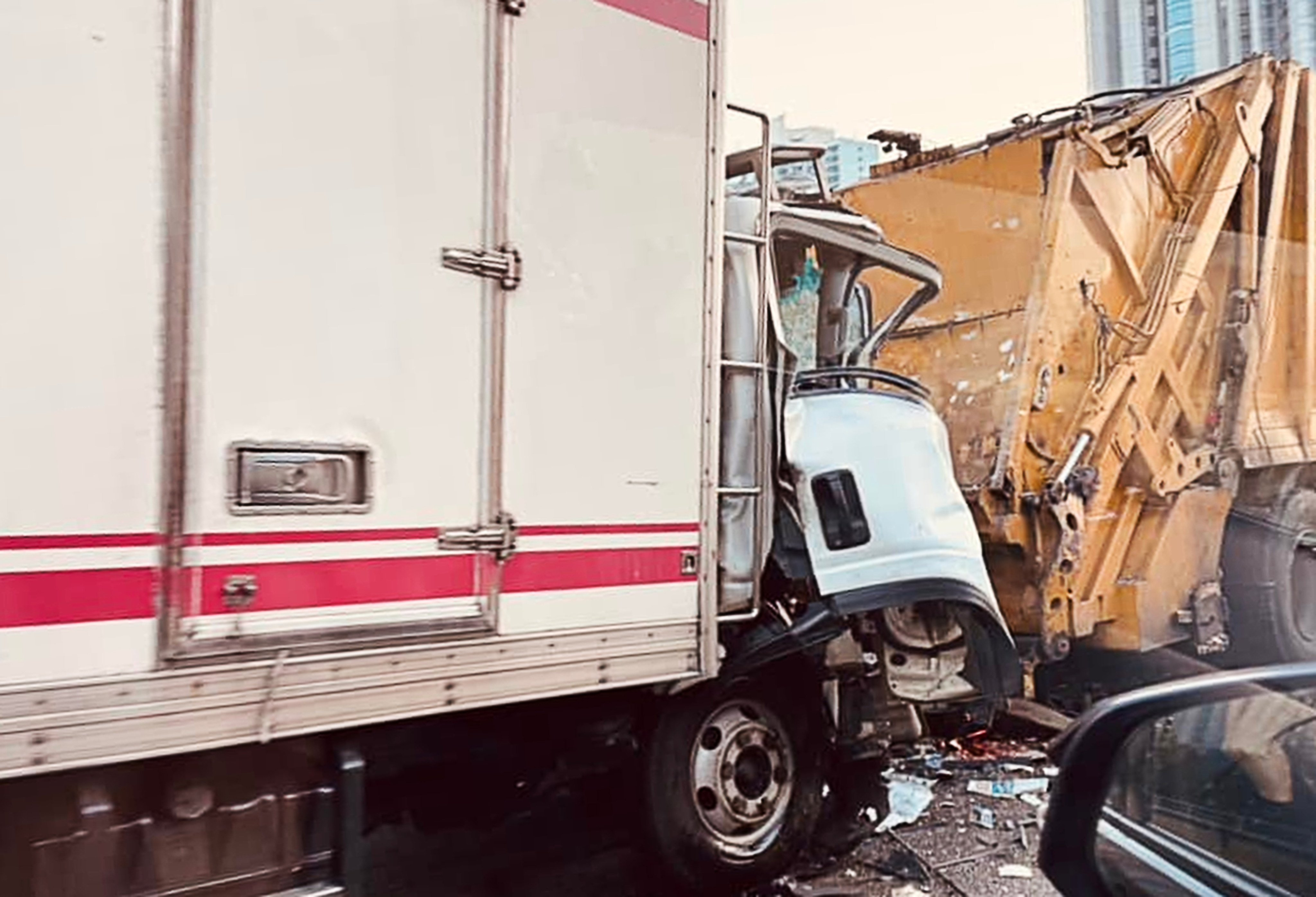 A truck driver died after a collision with a waste collection vehicle. Photo: Facebook/Lydia Chan