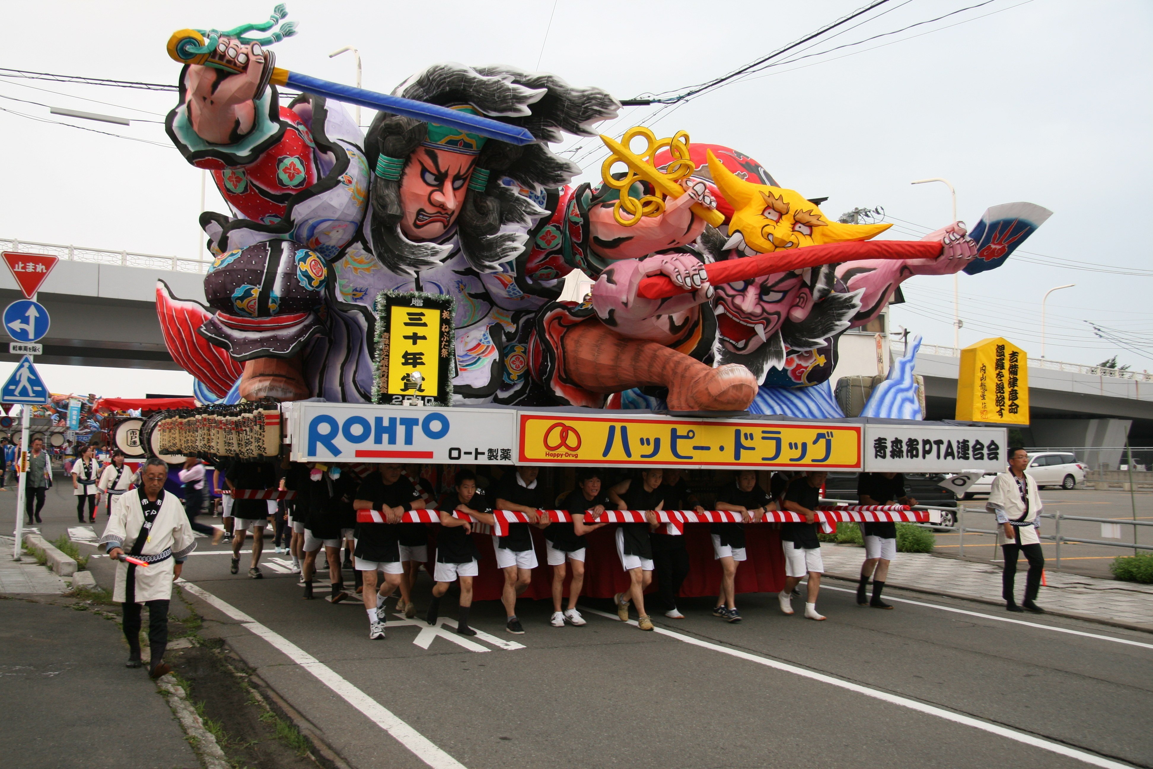 A team carries a float in preparation for the Aomori Nebuta Festival, a summer fire festival in the northeastern prefecture of Aomori, Japan, in 2010. The sale of premium seats to such spectacles, marketed to foreigners, worries native Japanese. Photo: Shutterstock