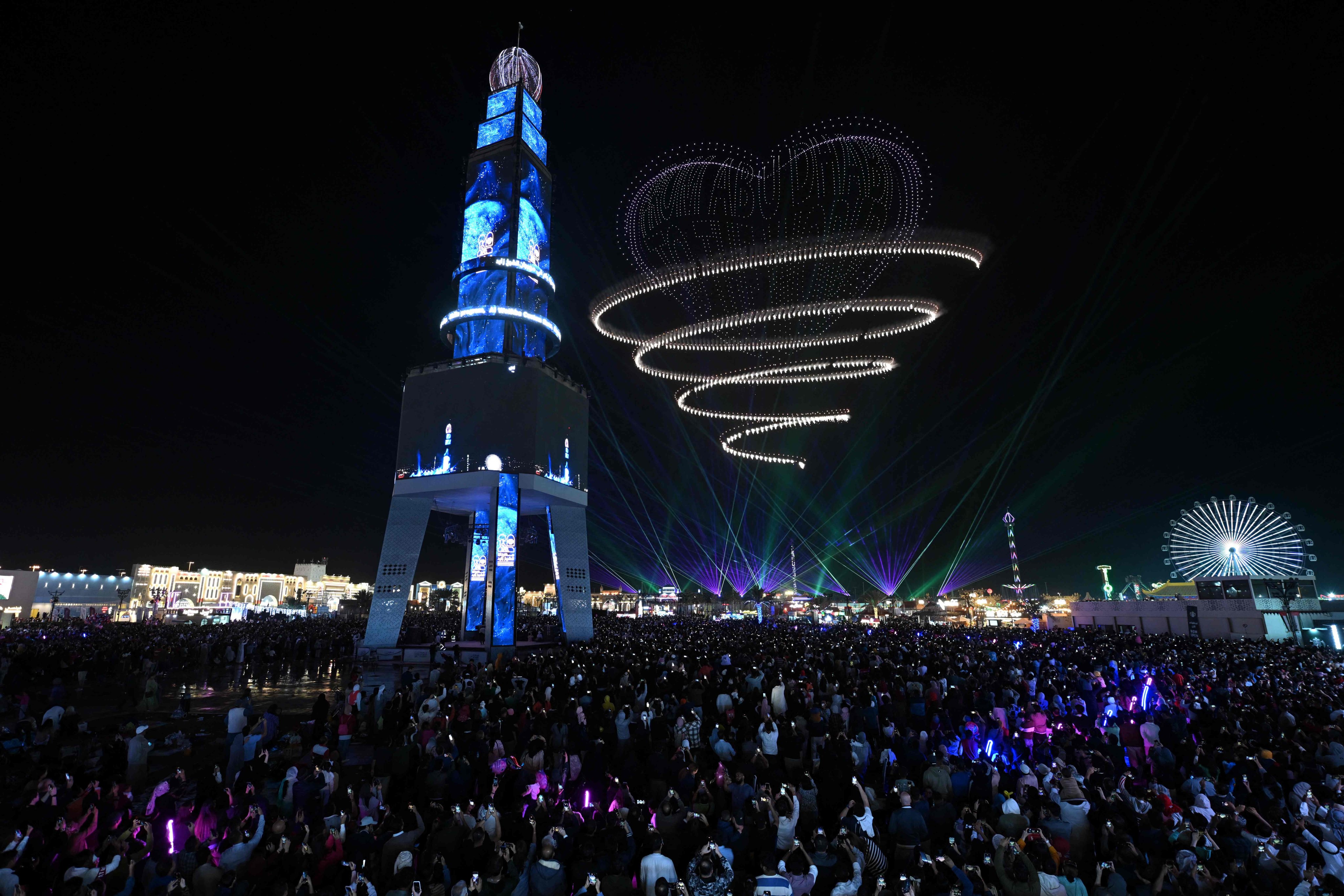 People watch a New Year show at the Sheikh Zayed Heritage Festival in Abu Dhabi on January 1, 2025. Photo: AFP