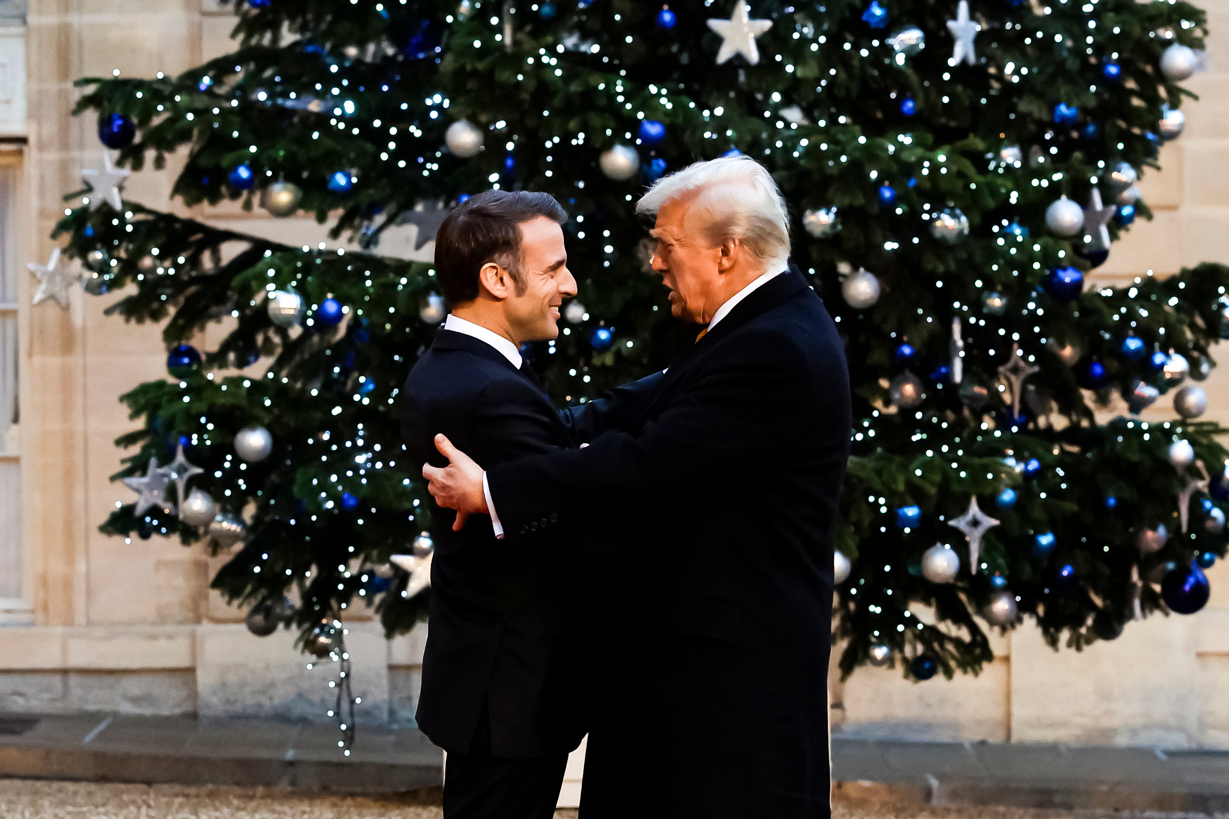 French President Emmanuel Macron and US President-elect Donald Trump in Paris on December 7. Photo: Zuma Press Wire / dpa