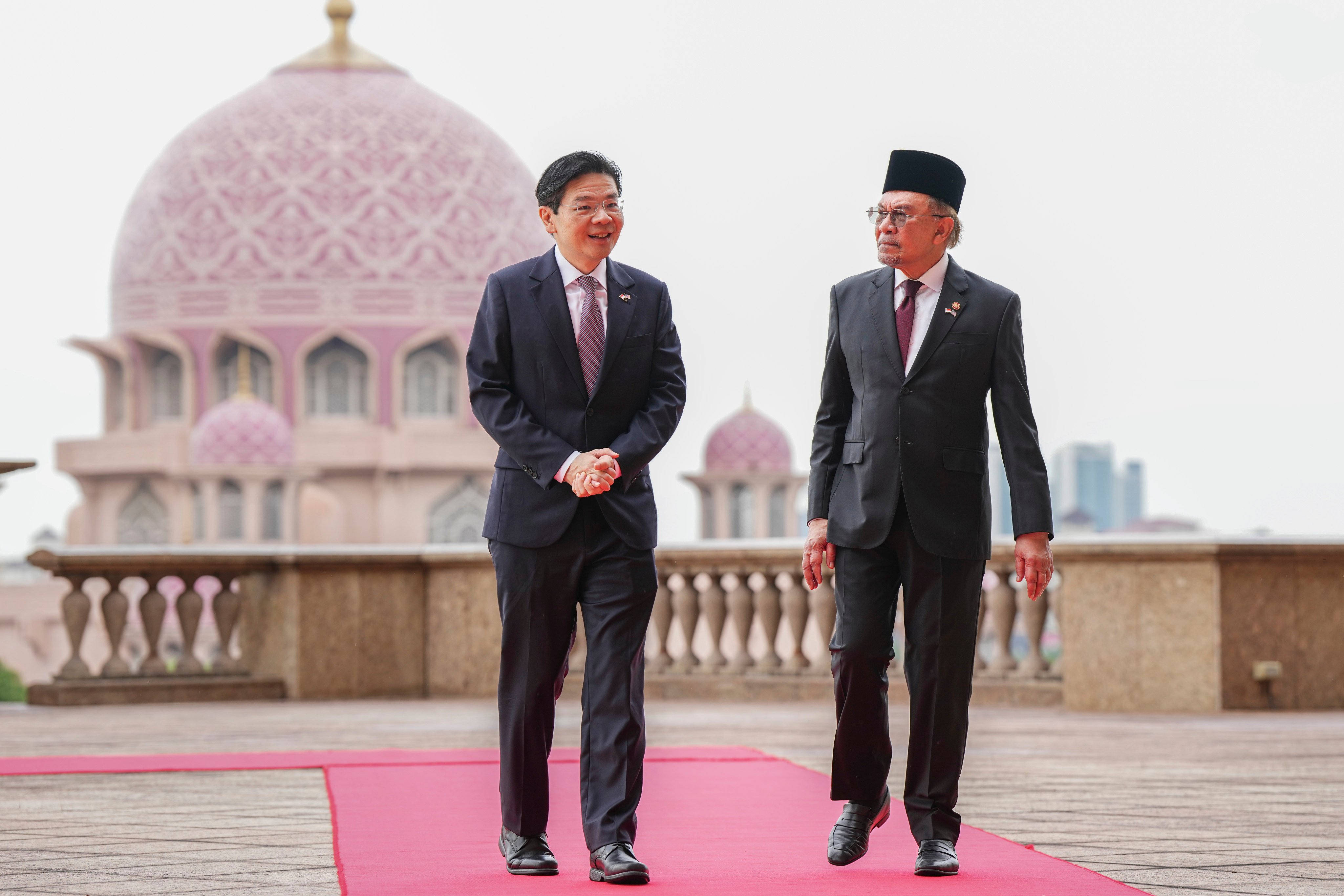 Singapore’s Prime Minister Lawrence Wong (left) with his Malaysian counterpart Anwar Ibrahim in Putrajaya, Malaysia, on Tuesday. Photo: AP