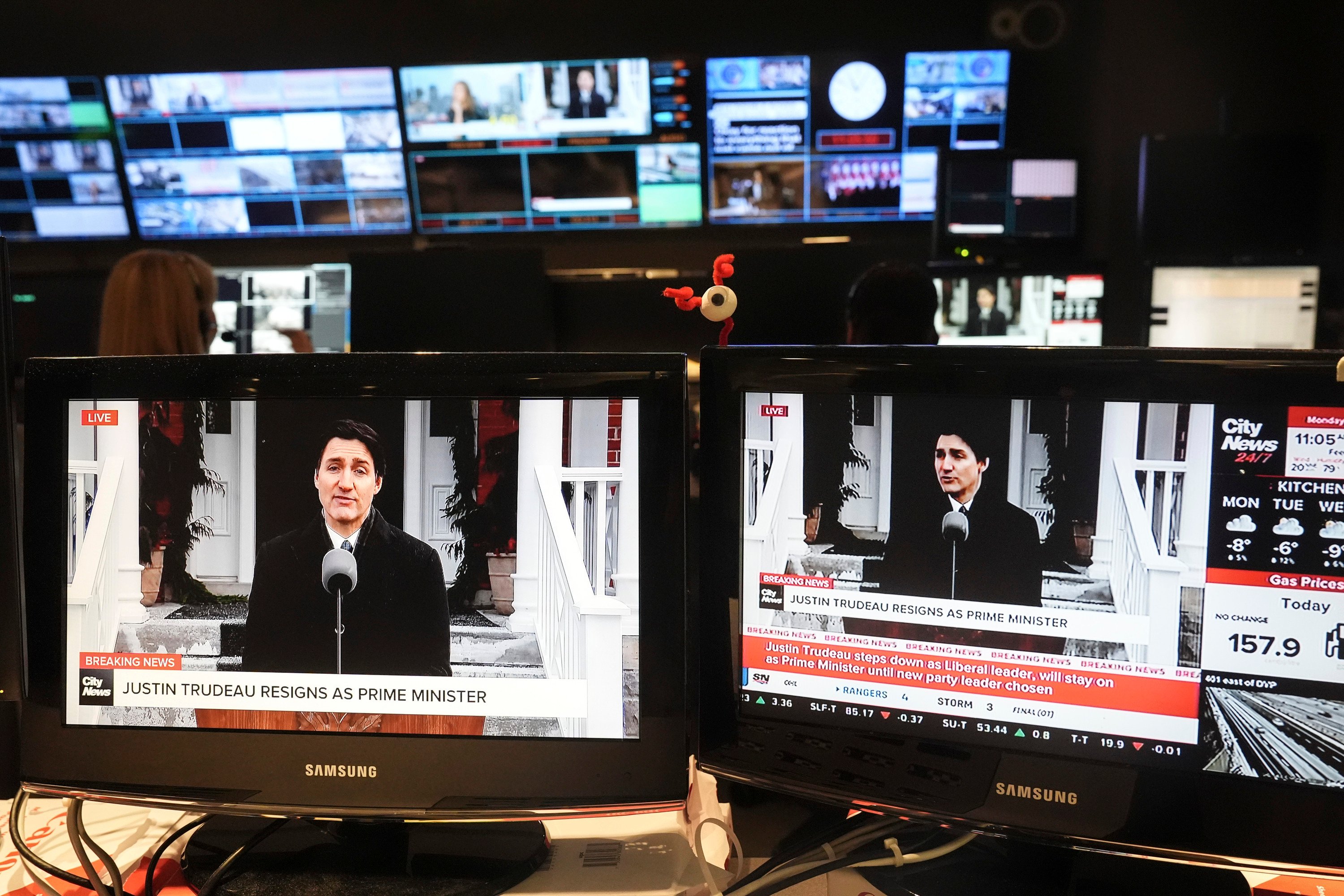 Canada Prime Minister Justin Trudeau is seen on screens in a control room at City News in Toronto as he holds a new conference in Ottawa. Photo: The Canadian Press via AP