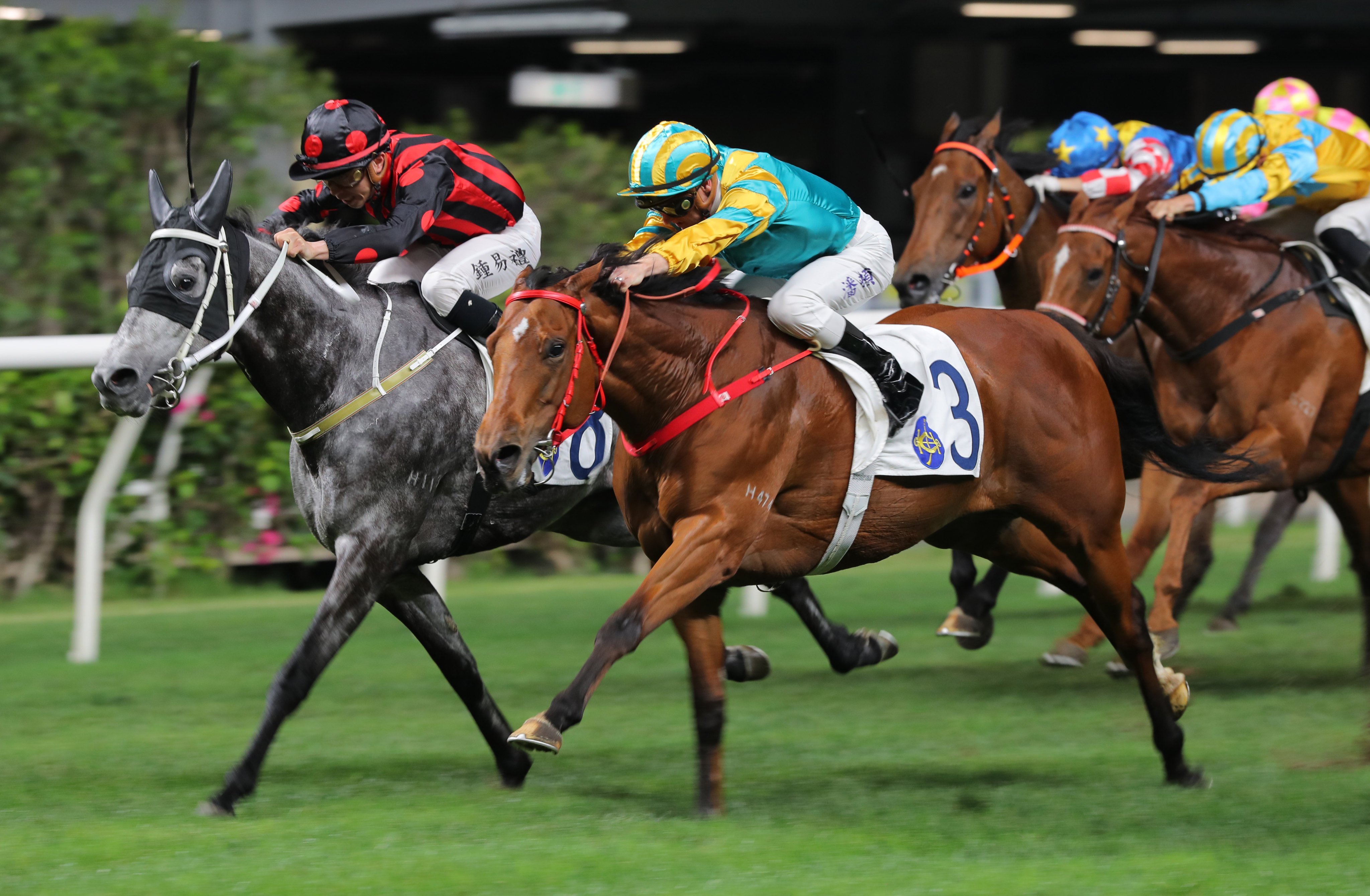 Moments In Time (outside) scores under Zac Purton at the Valley last season. Photos: Kenneth Chan