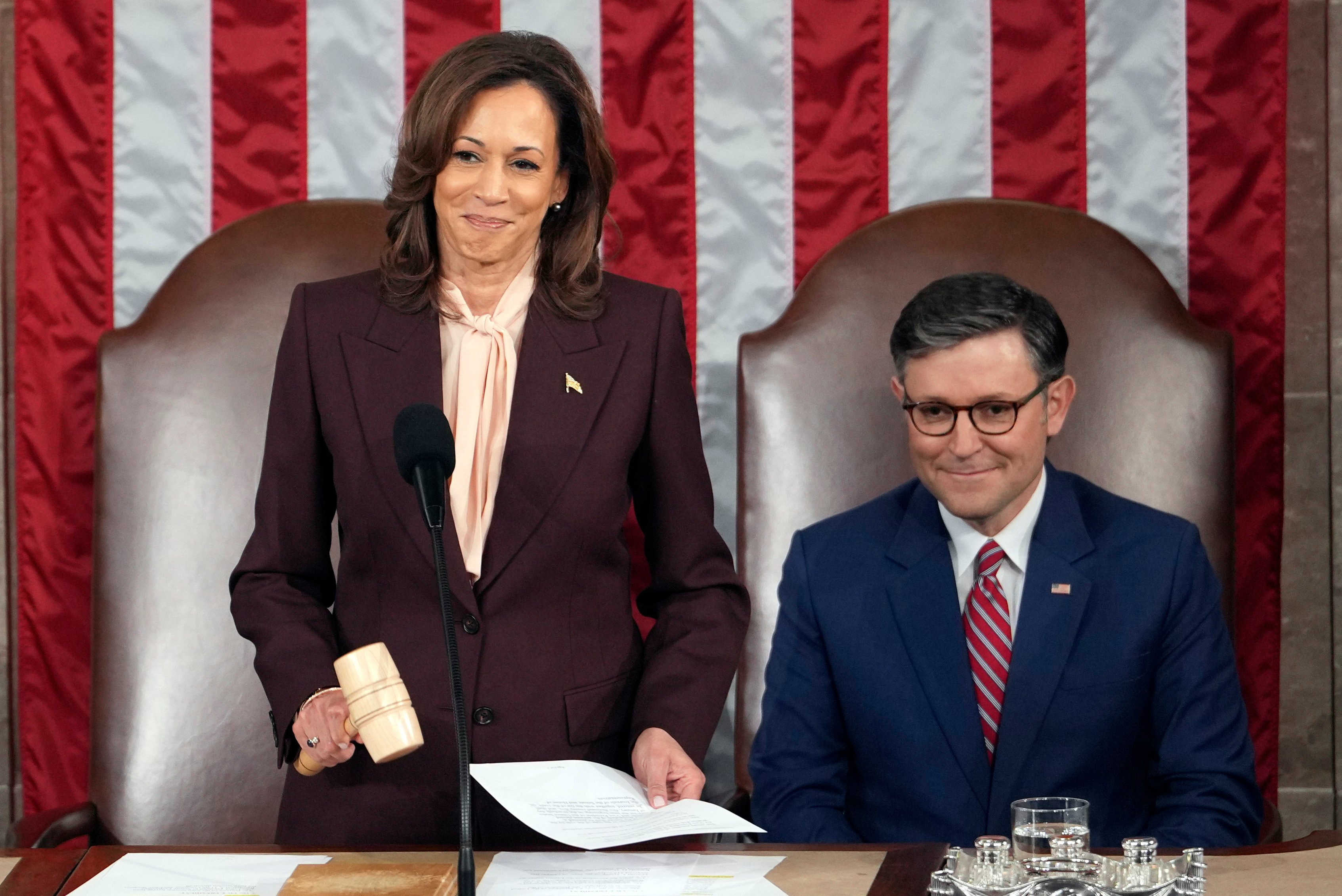 Vice President Kamala Harris reads the results as House Speaker Mike Johnson of La., listens during a joint session of Congress to confirm the Electoral College votes, affirming President-elect Donald Trump’s victory in the presidential election, Monday, Jan. 6, 2025, at the U.S. Capitol in Washington. (AP Photo/Matt Rourke)