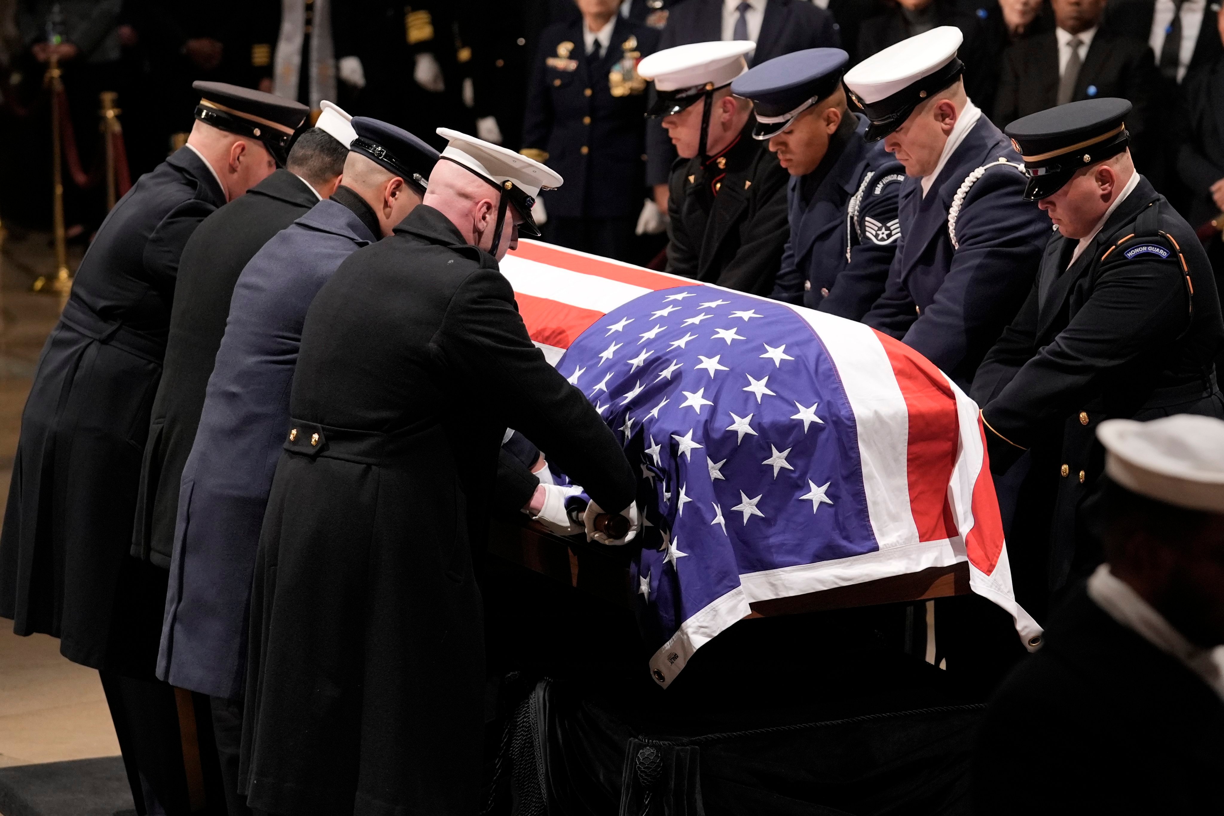 A military honour guard places the flag-draped casket of former US president Jimmy Carter in the US Capitol in Washington on Tuesday. Photo: EPA-EFE