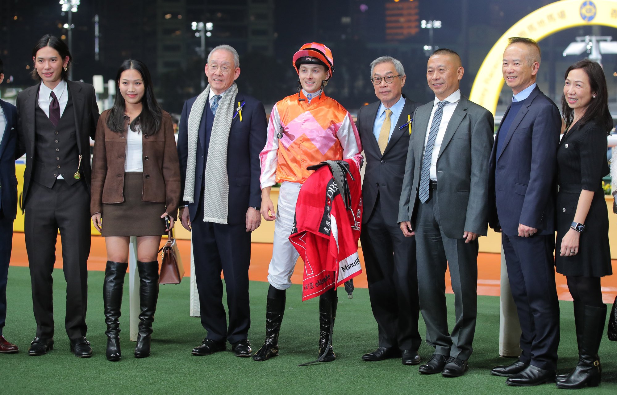 Jockey Harry Bentley, trainer Danny Shum (third from right) and connections of Helene Feeling celebrate.