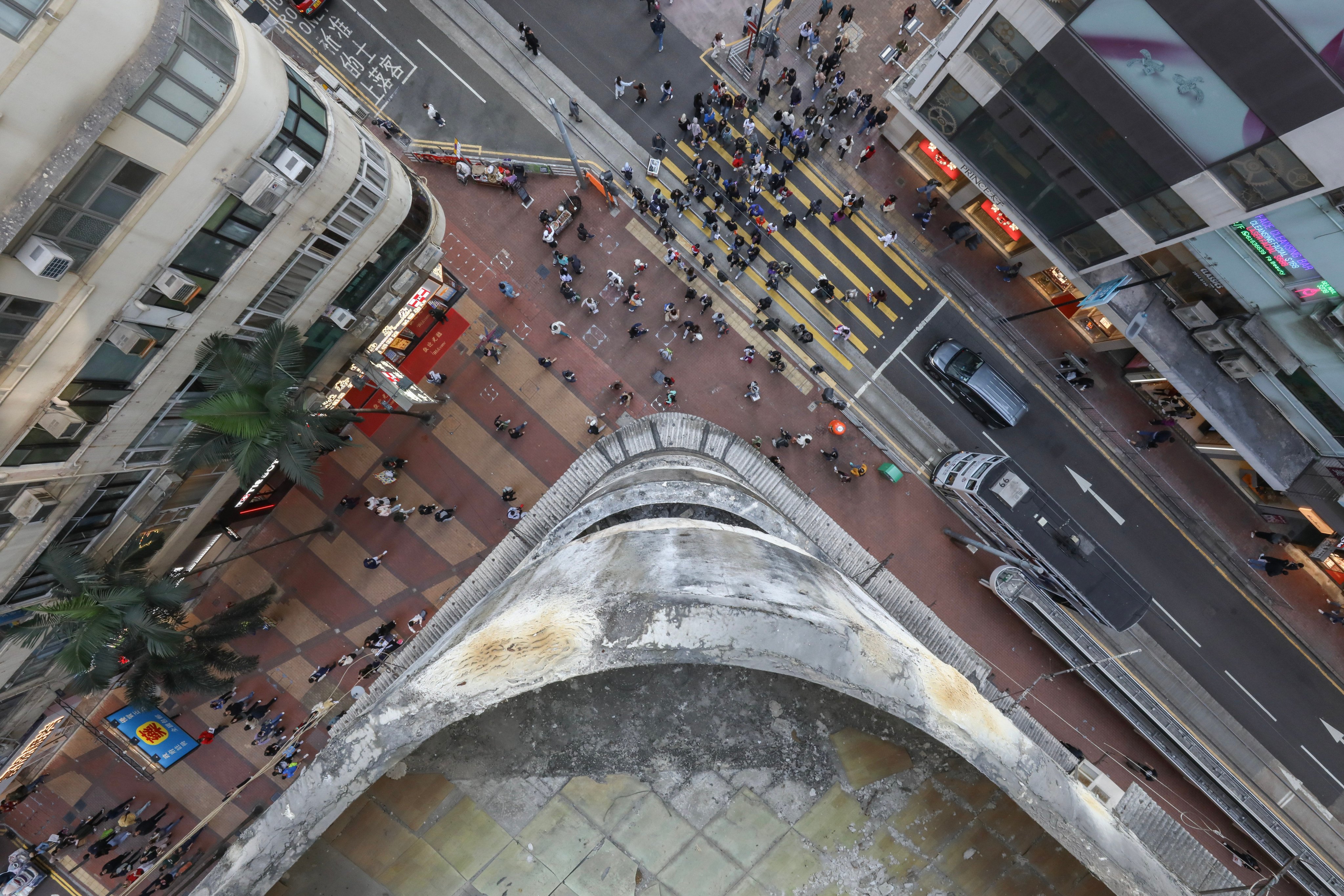 The view from the top of No. 76 Percival Street in Causeway Bay. An elderly man was injured when concrete fell from the building on Friday. Photo: Antony Dickson