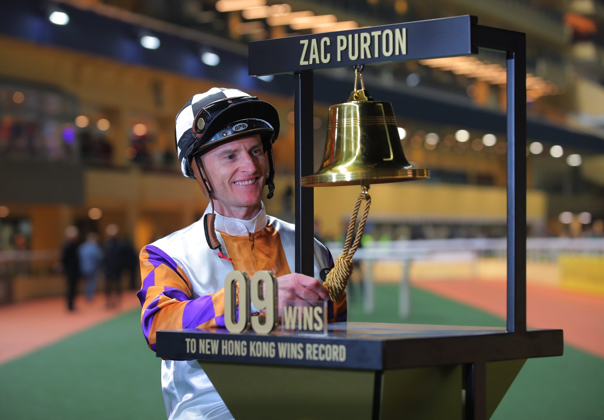 Zac Purton rings the commemorative bell counting down his pursuit of Douglas Whyte’s record.