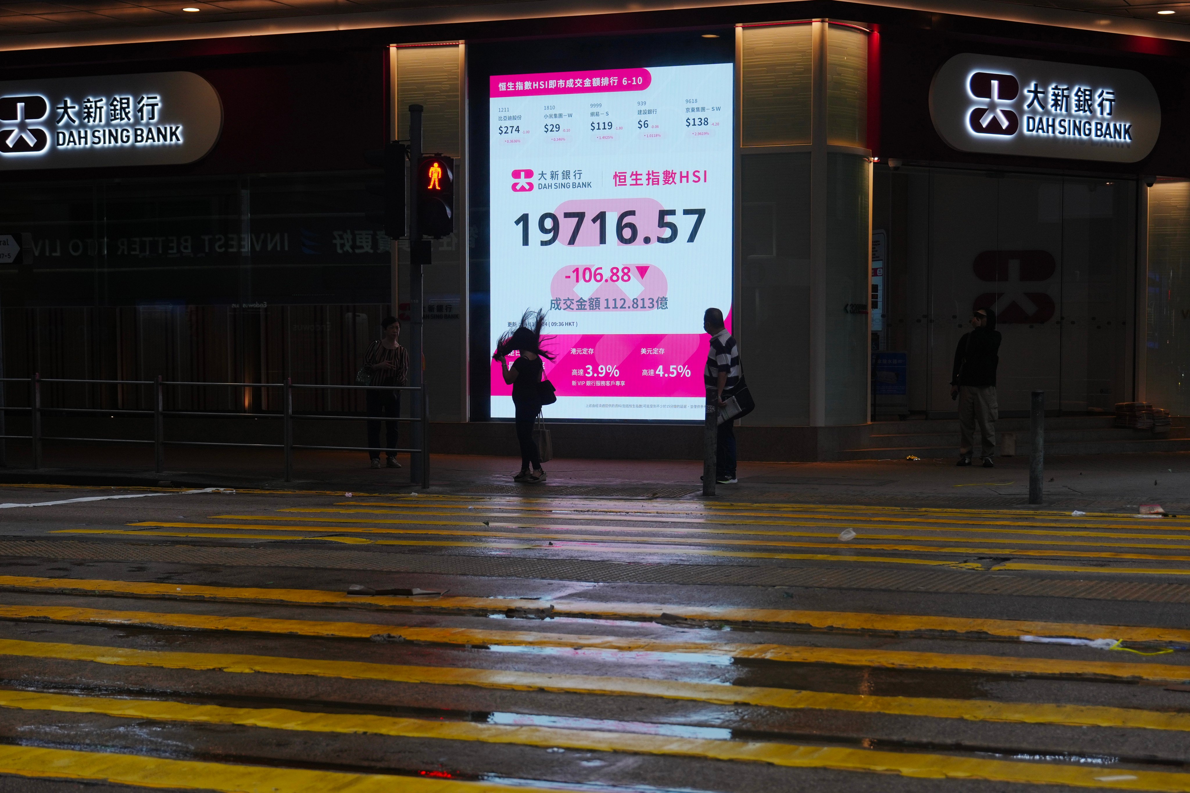 The Hang Seng Index is displayed on November 14, 2024, when the stock exchange operated for the first time during a severe typhoon conditions. Photo: Sam Tsang