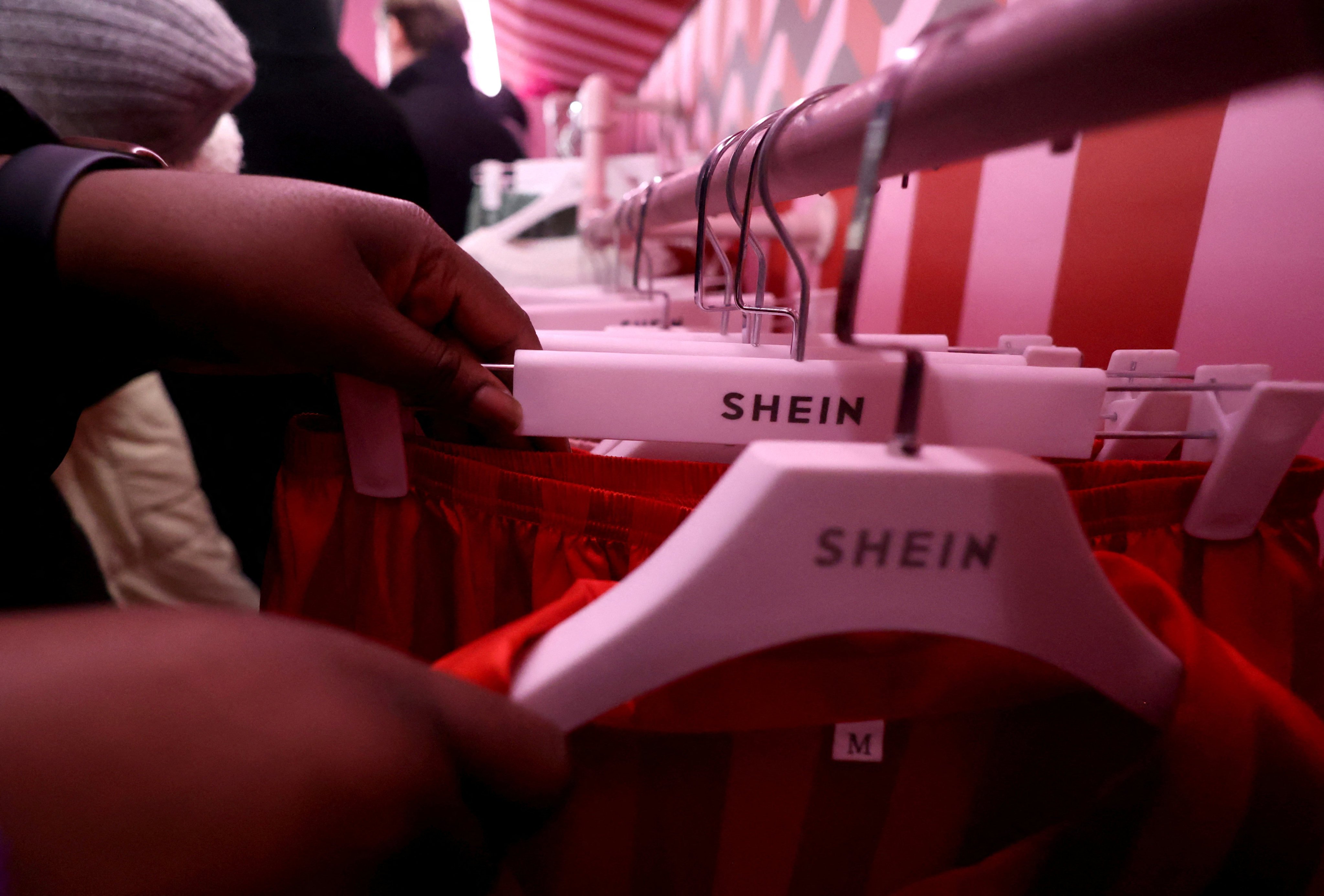 Shoppers visit Shein’s promotional Christmas bus tour, in Manchester, Britain, in December. Photo: Reuters