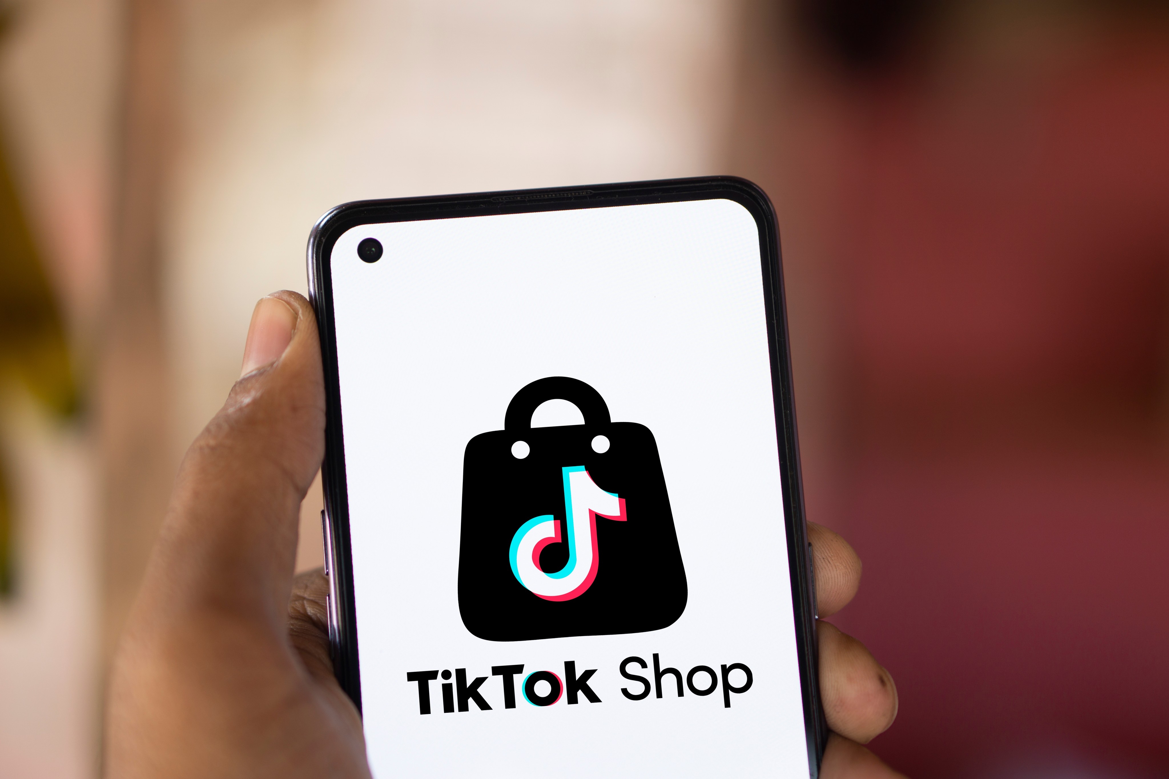 The TikTok Shop logo is displayed on a smartphone. Photo: Shutterstock Images