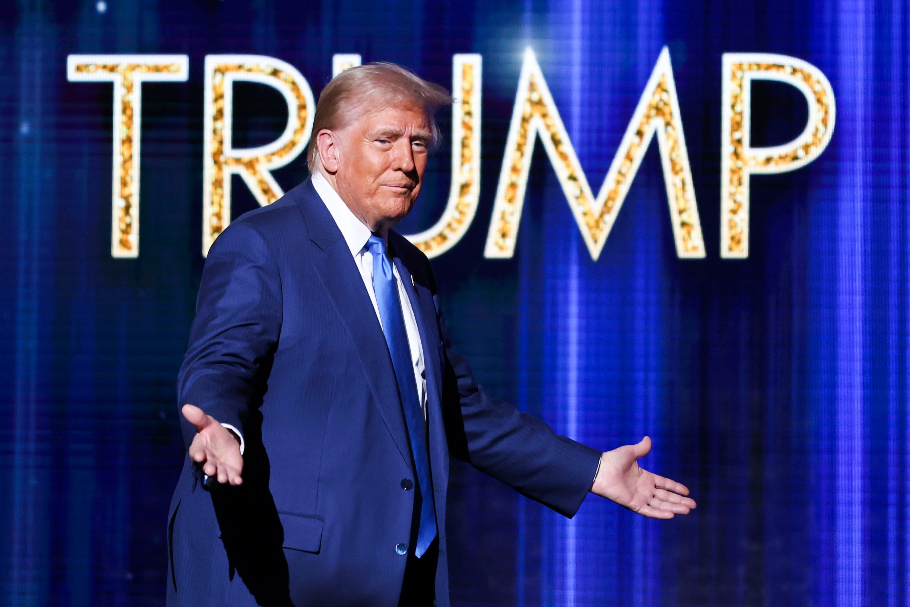 US president-elect Donald Trump takes the stage before he speaks in Greenvale, New York, on December 5, 2024. Photo: AP