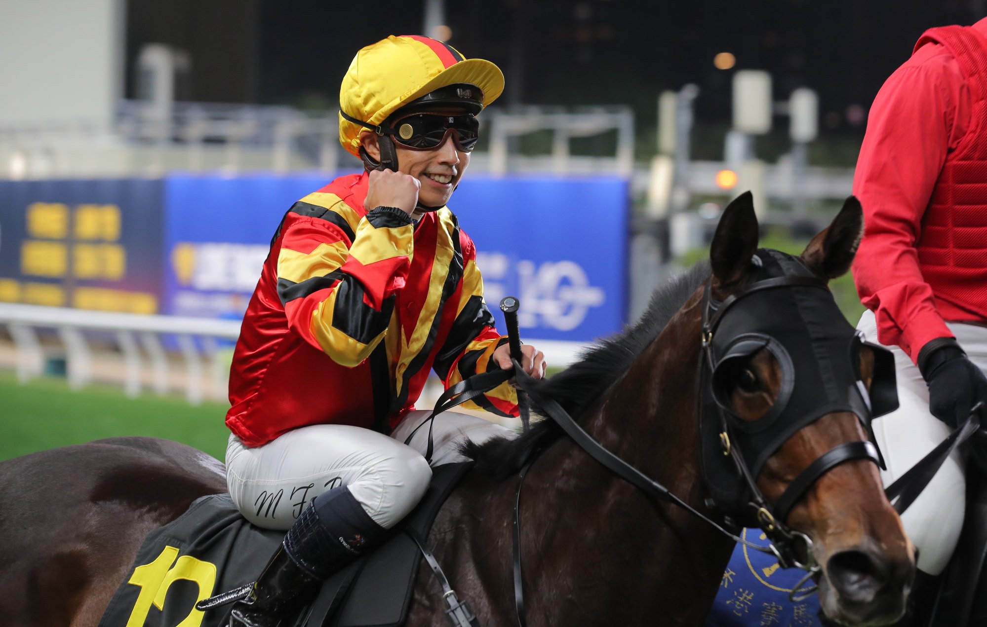 Matthew Poon celebrates Fortune Whiskey’s win at Happy Valley.