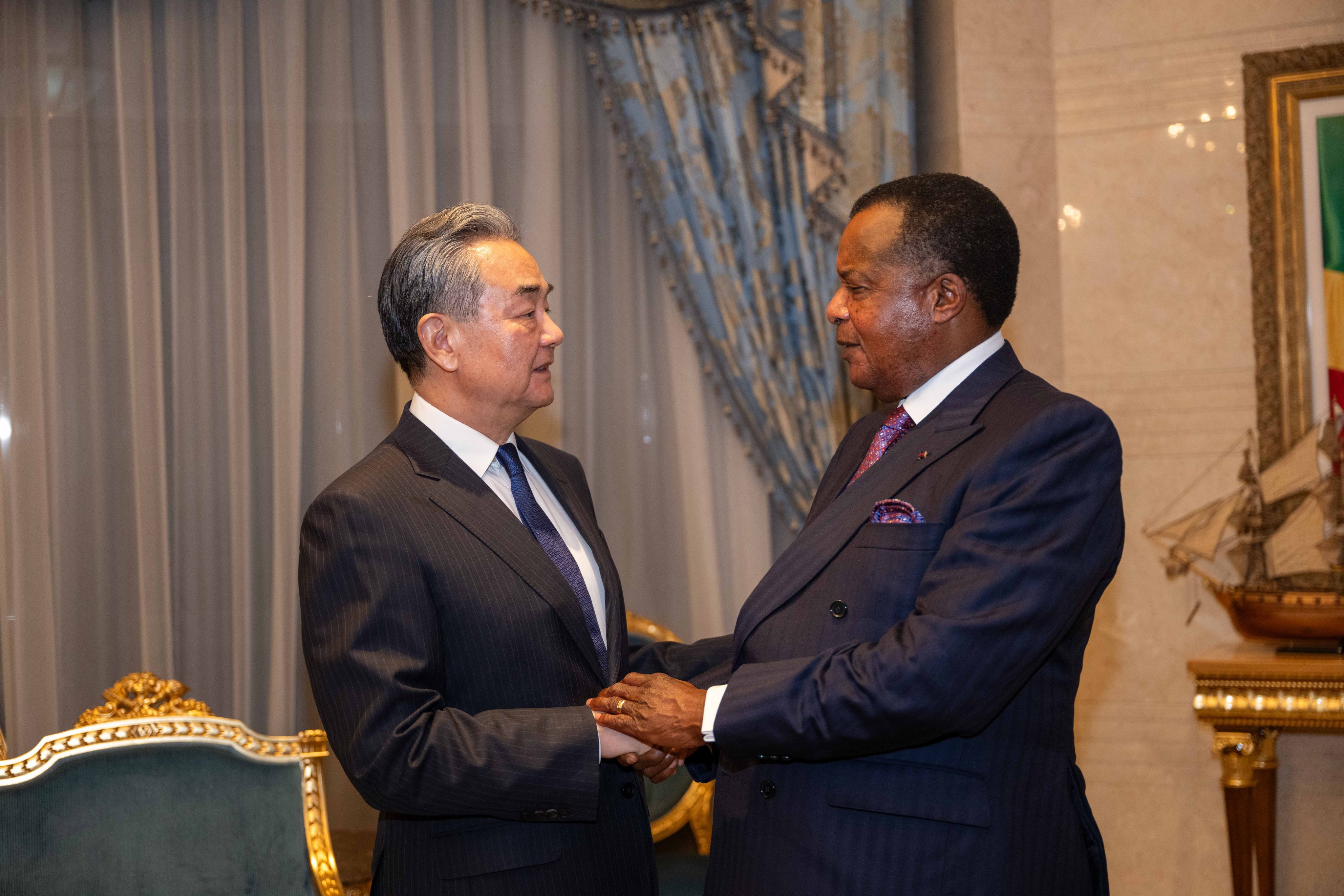 Chinese Foreign Minister Wang Yi and Republic of the Congo’s President Denis Sassou Nguesso in Brazzaville on Tuesday. Photo: Xinhua