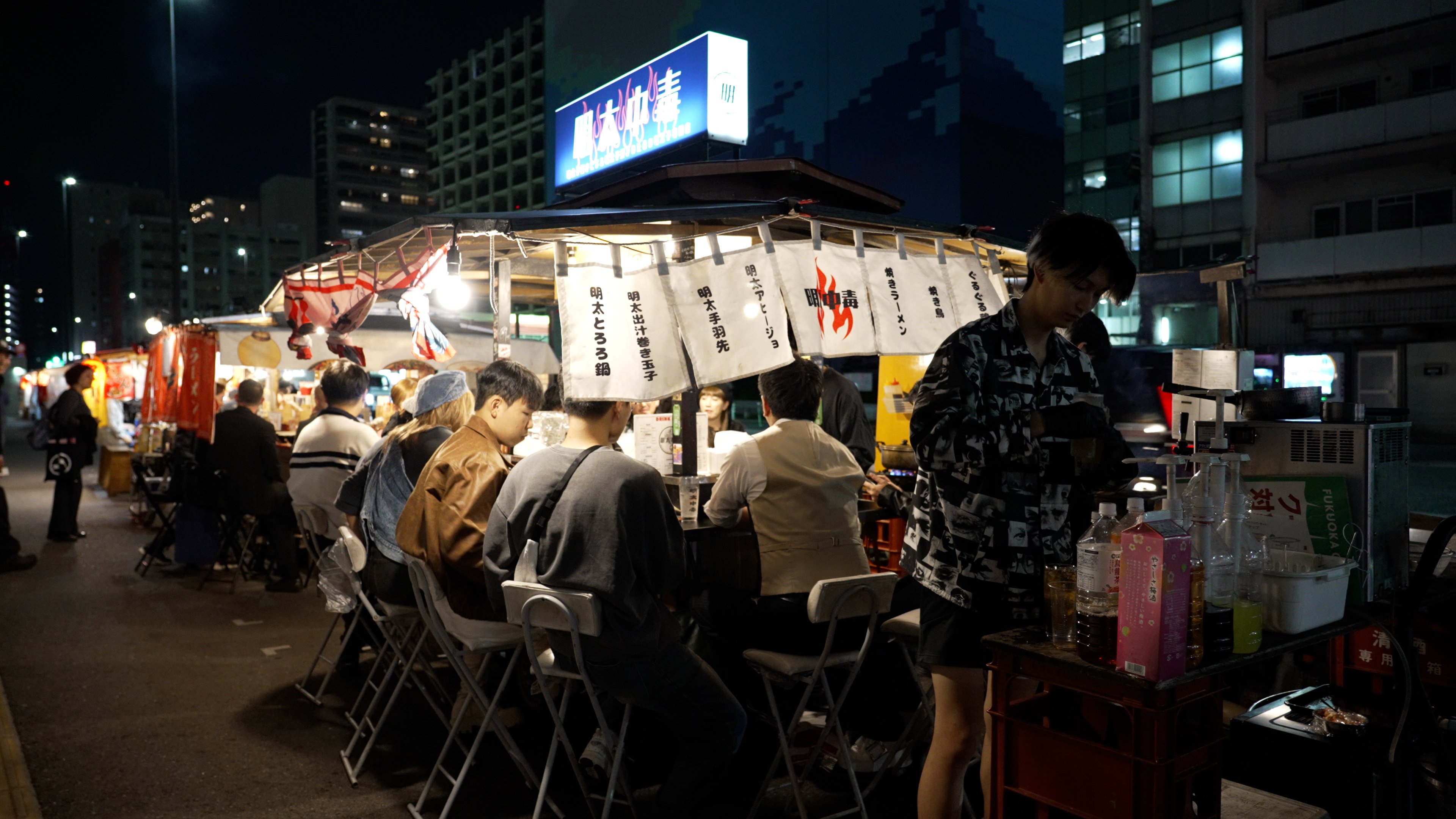 An open-air food stall in Fukuoka, Japan. Photo: Llewellyn Cheung