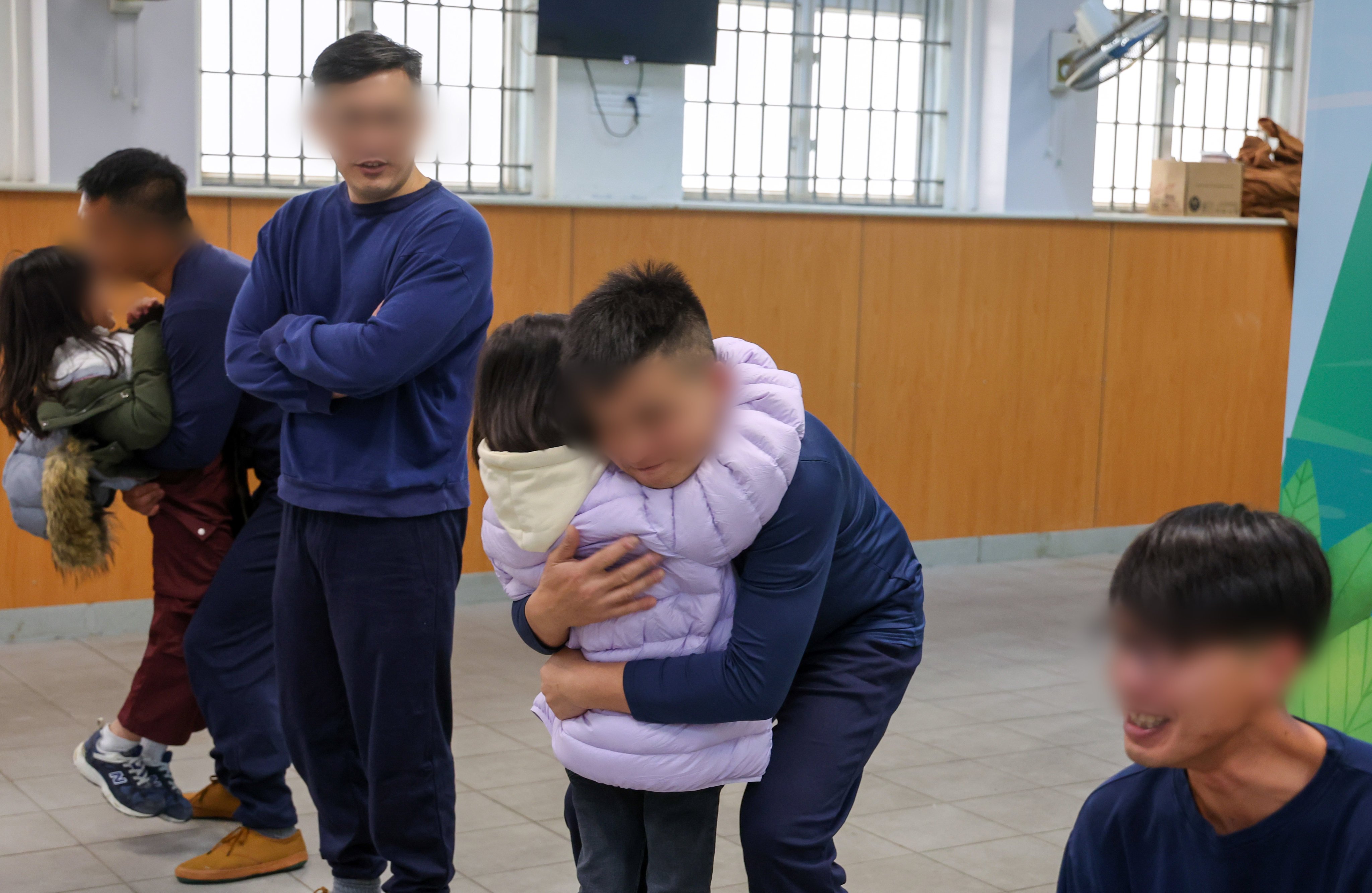 Incarcerated fathers interact with their children at the parent-child centre in Stanley Prison. Photo: Dickson Lee 