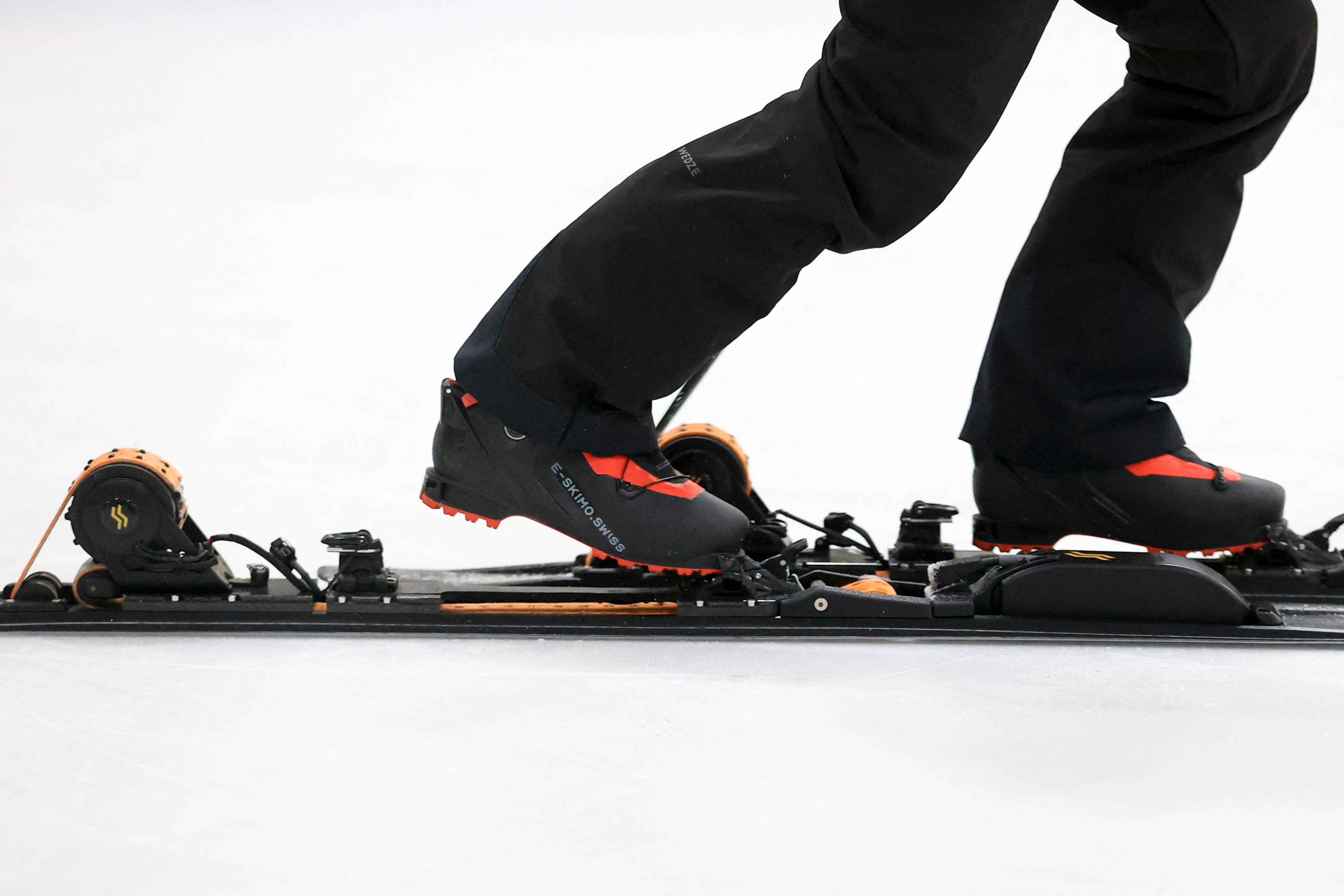 E-Skimo founder Nicola Colombo demonstrates his battery-assisted skis. Photo: AFP