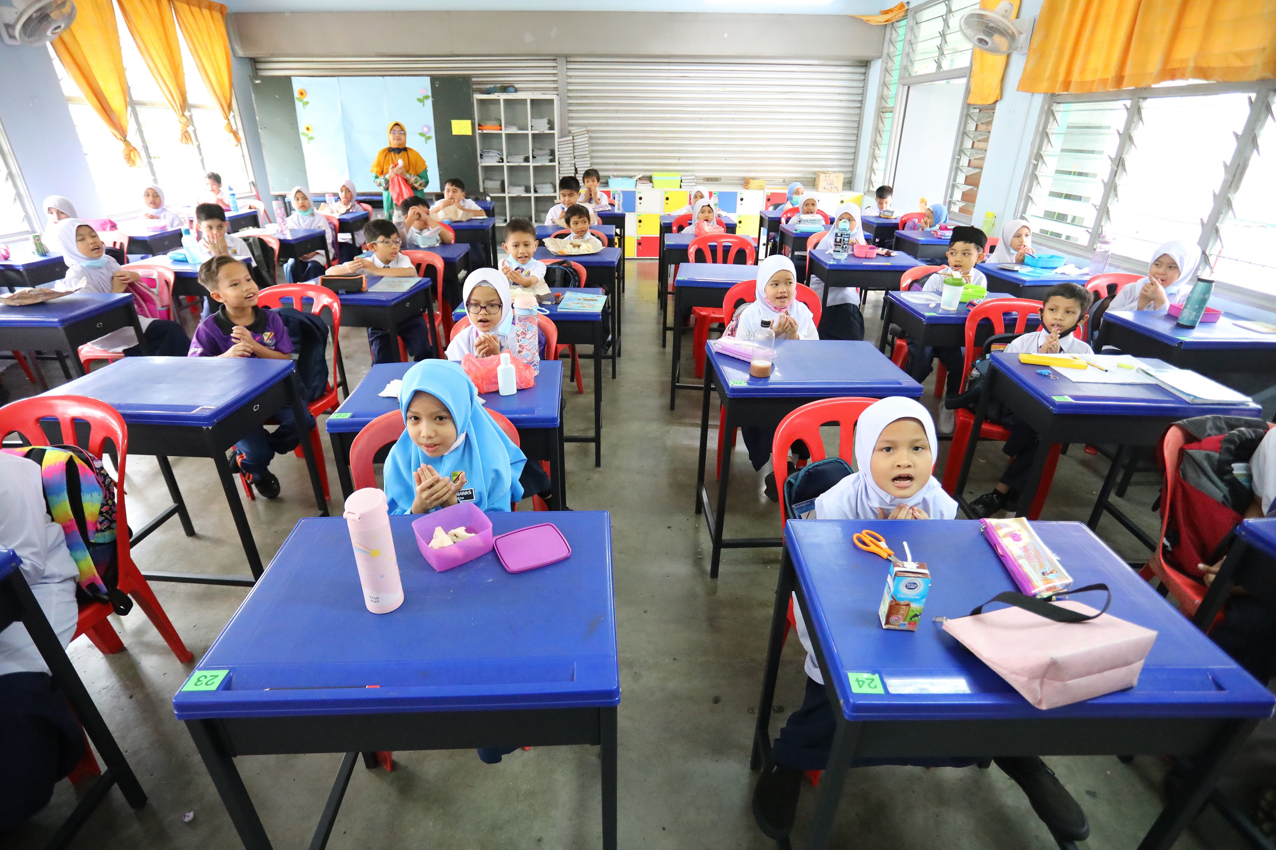 Pupils attend class at a primary school in Selangor, Malaysia. More non-Chinese Malaysians are embracing Mandarin. Photo: Shutterstock